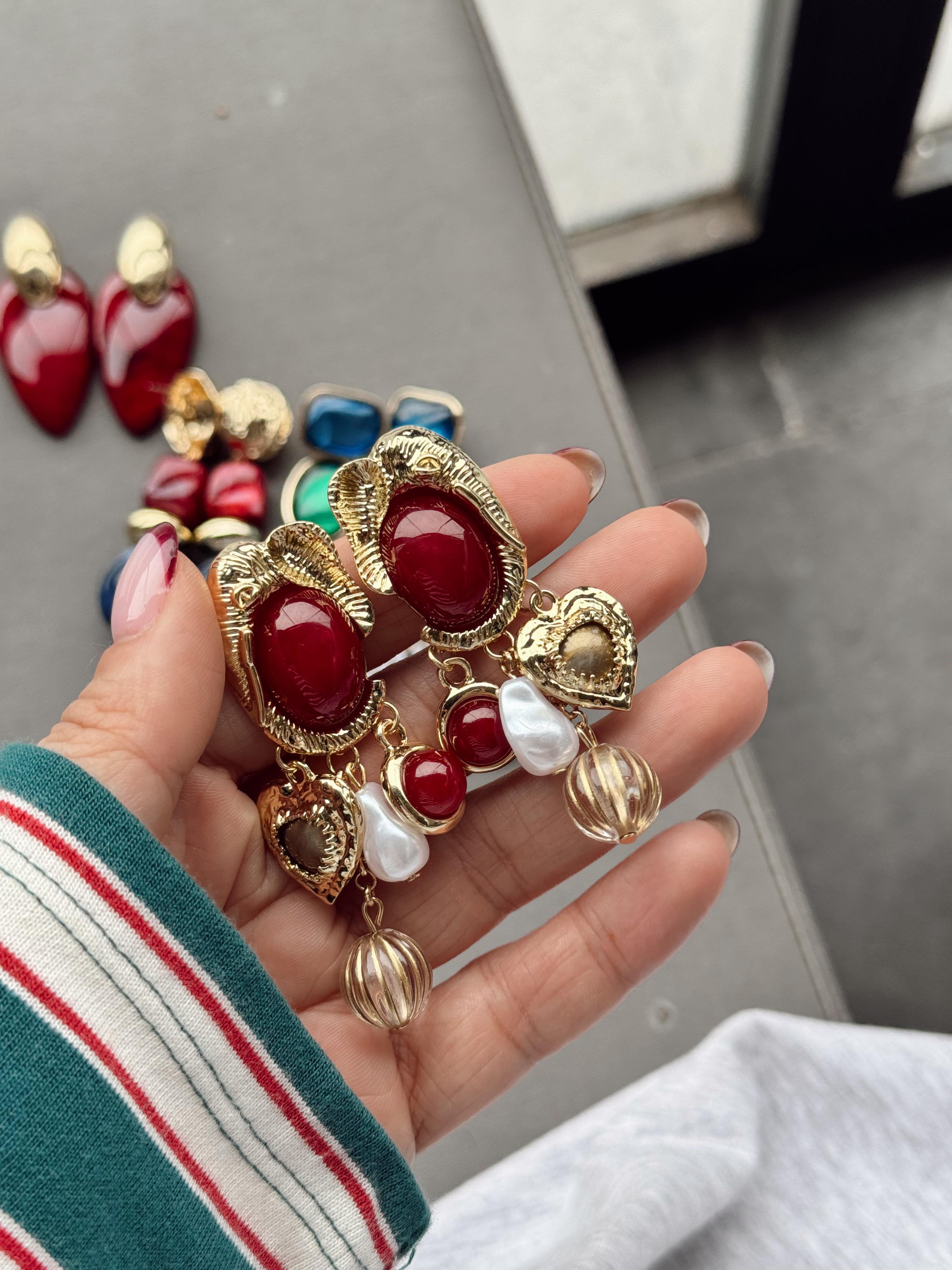 Fil ve boncuk detaylı ZARA küpe 