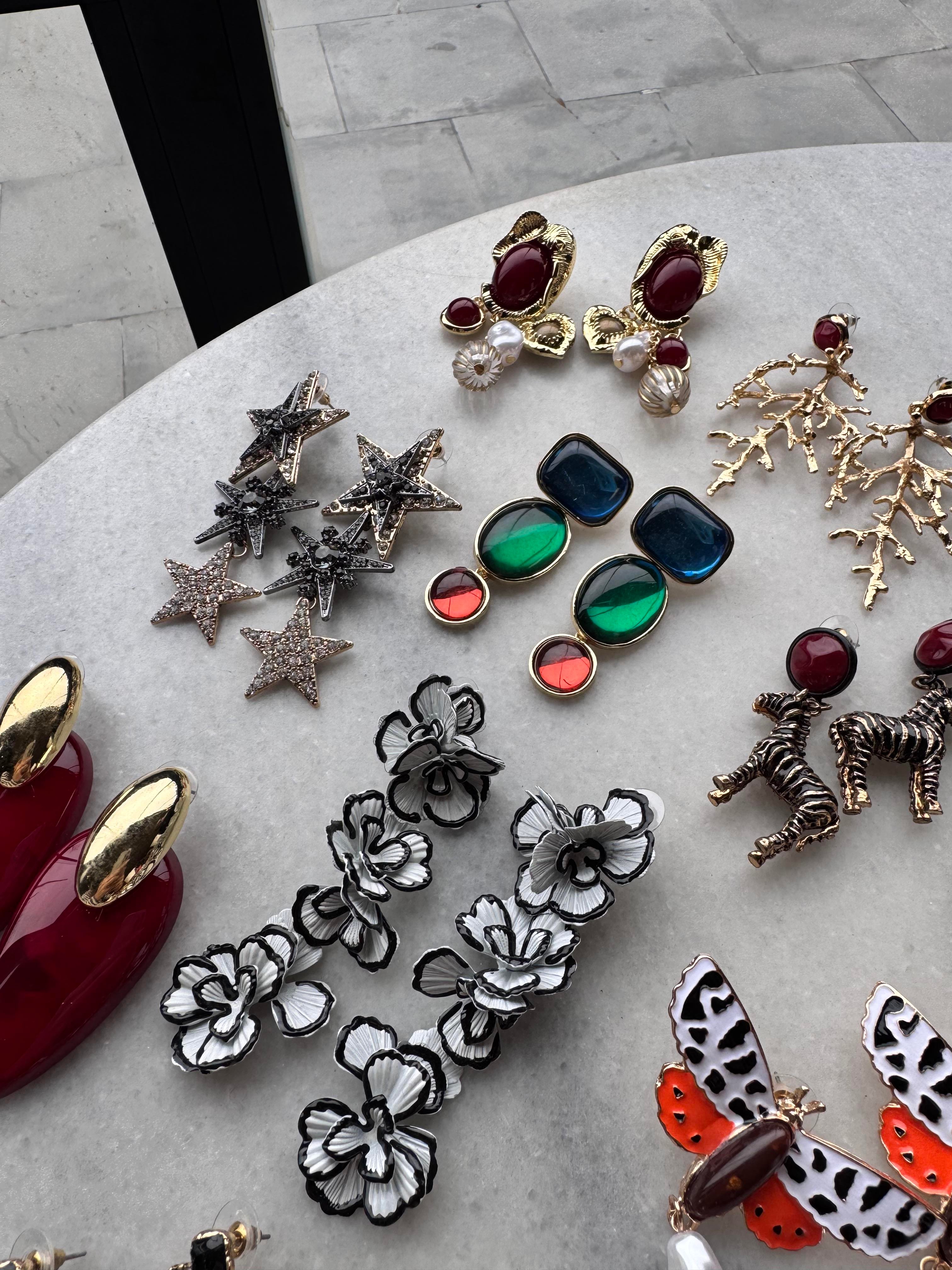 Fil ve boncuk detaylı ZARA küpe 