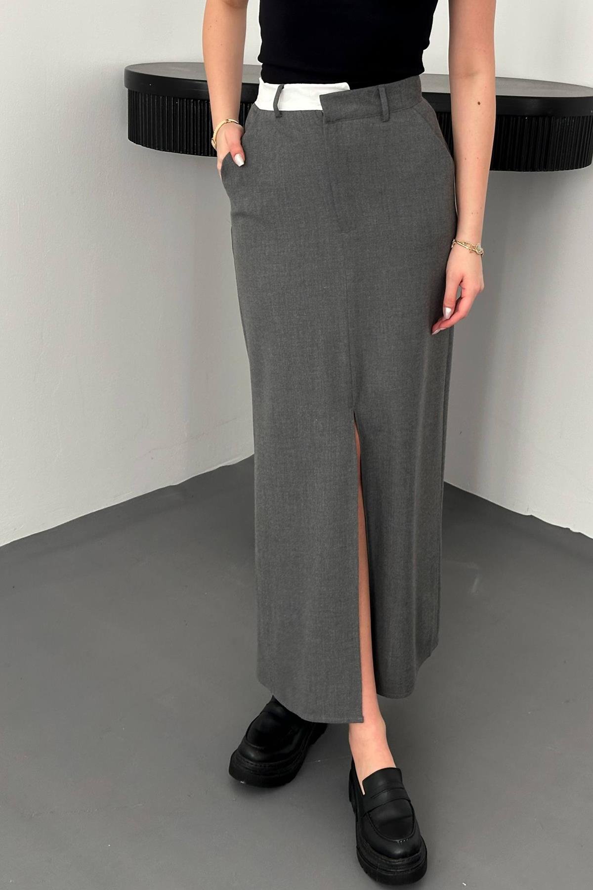 Оптовая продажа серая клетчатая юбка из поливискона с отделкой