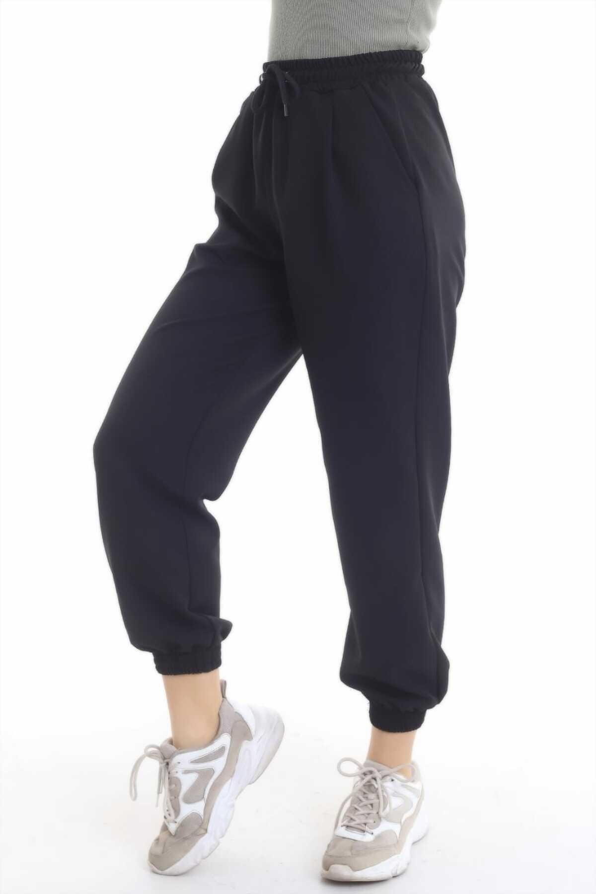 Toptan Siyah Bel ve Paça Lastik Detay Kumaş Pantolon