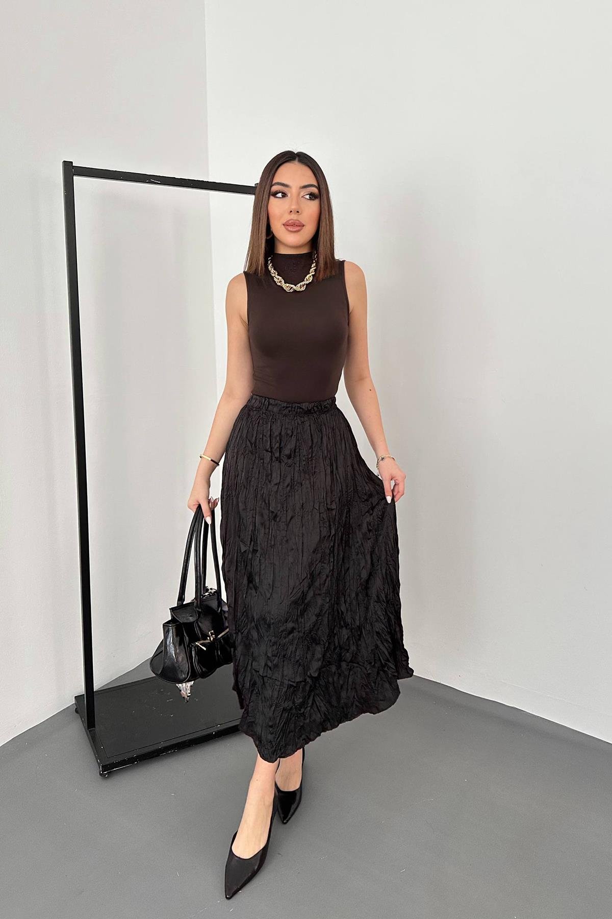 تنورة محبوكة باللون الأسود للبيع بالجملة