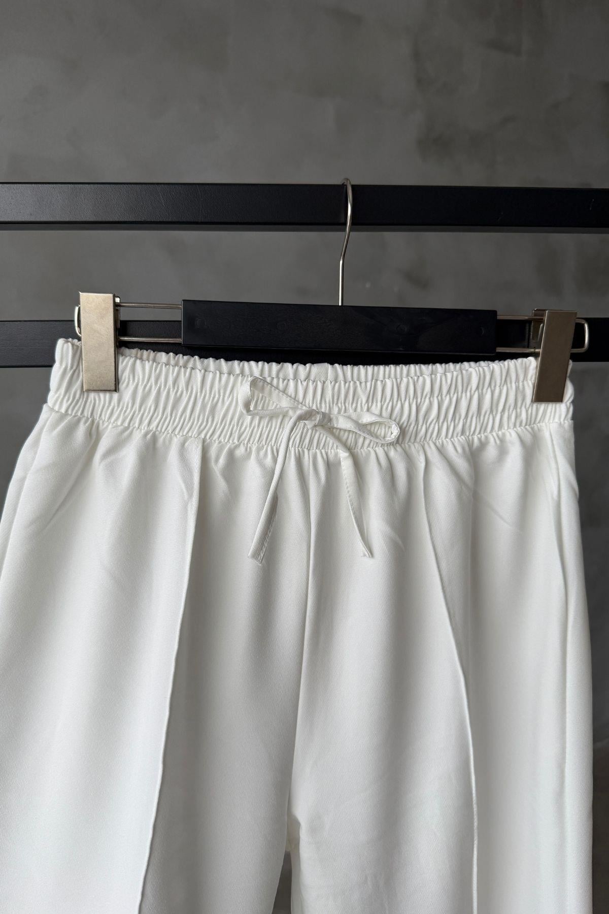 Beyaz Çımalı Pantolon