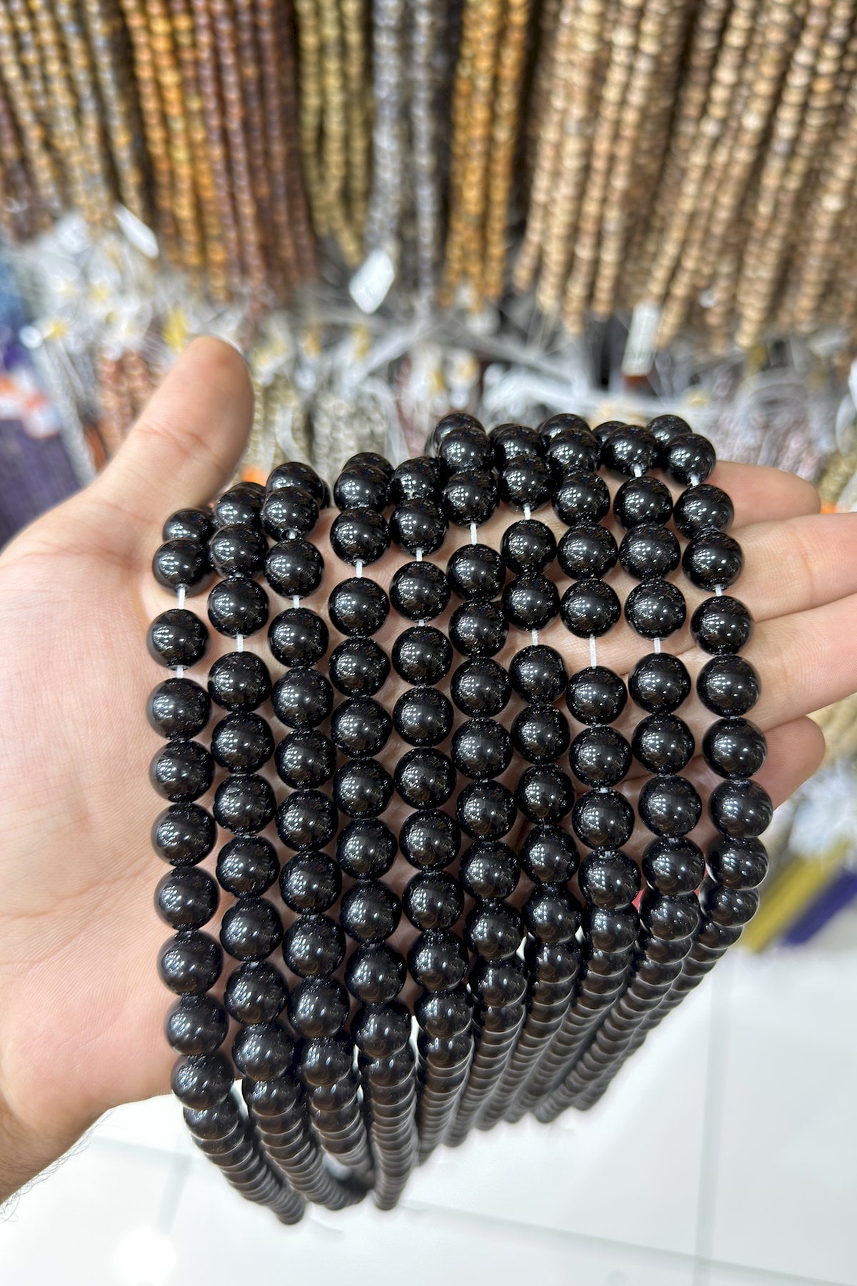 Glass Shiny Black Globe Cut 10mm String Of Beads