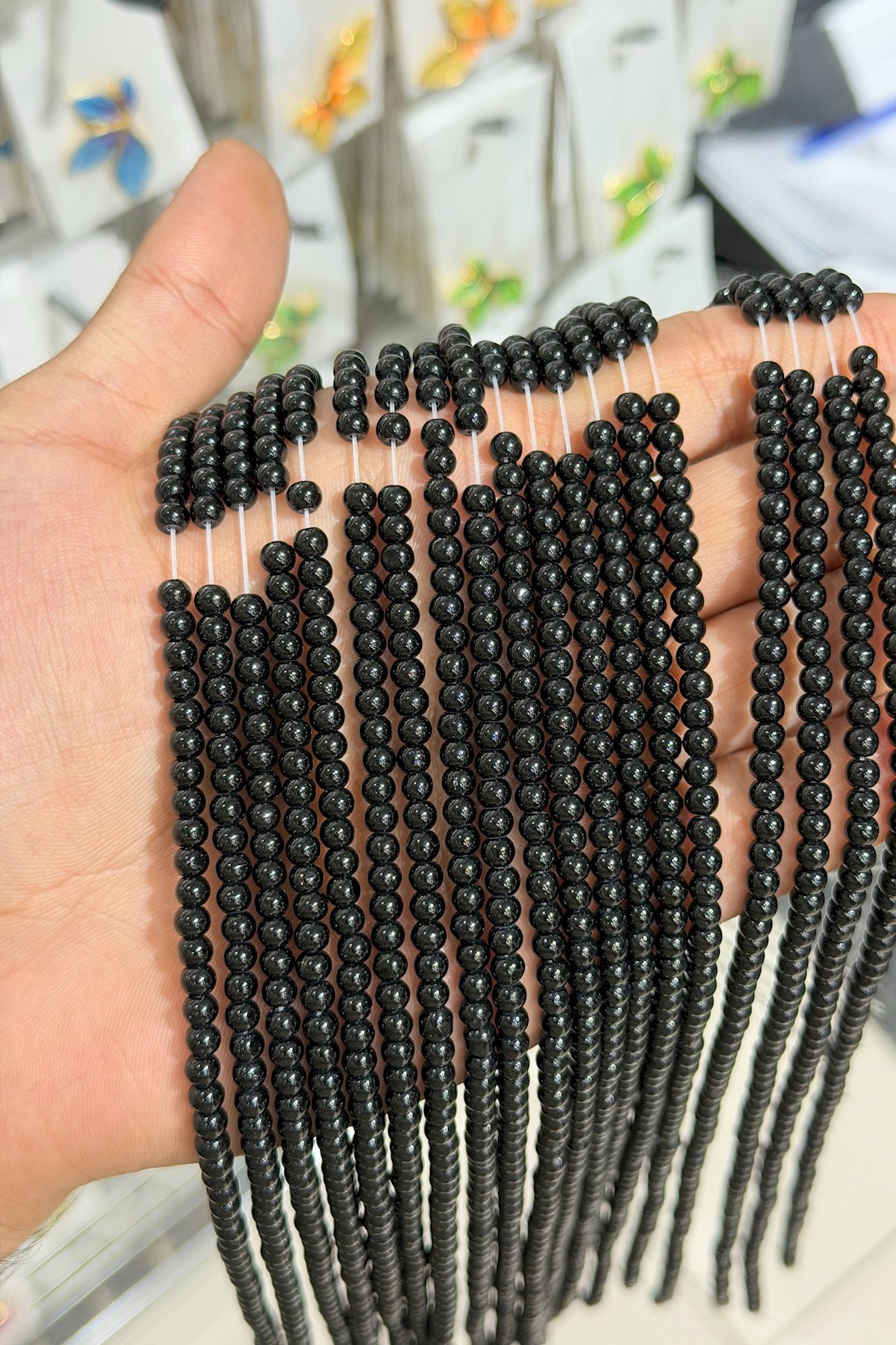 Onyx Glass Shiny Black Globe Cut 4mm String Of Beads
