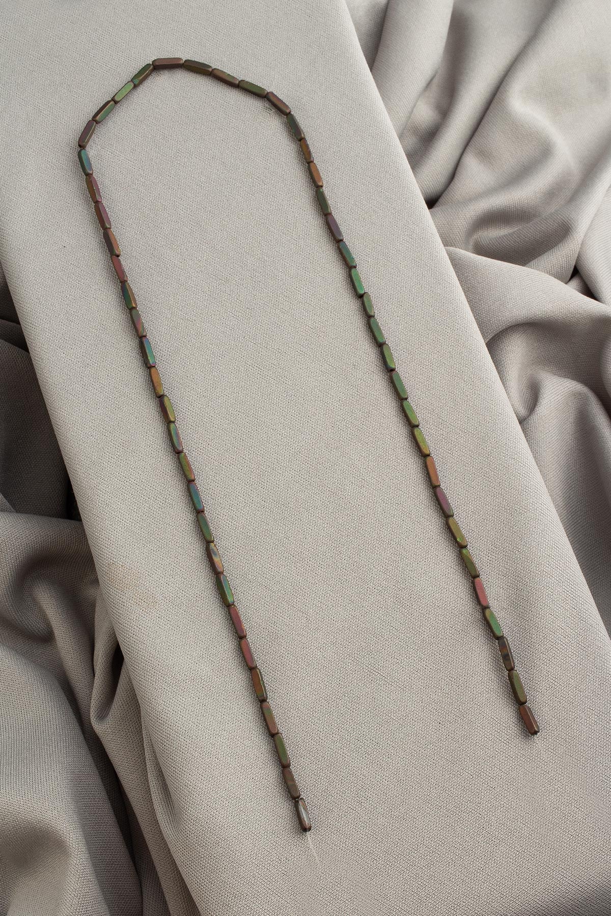 Hematite Natural Stone Matte Black Rainbow Dished Rectangular 2x8mm String Of Beads