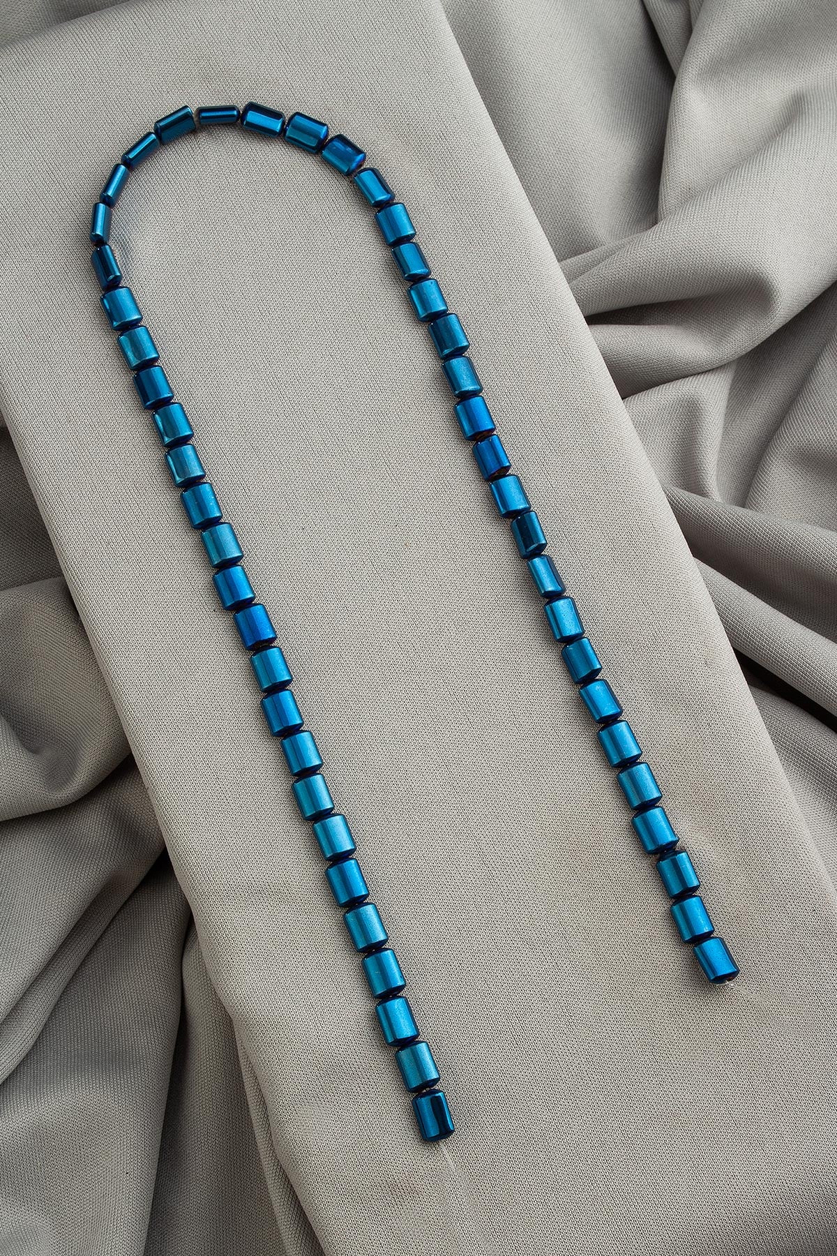 Hematite Natural Stone Shiny Blue Cylinder Cut 6x8mm String Of Beads