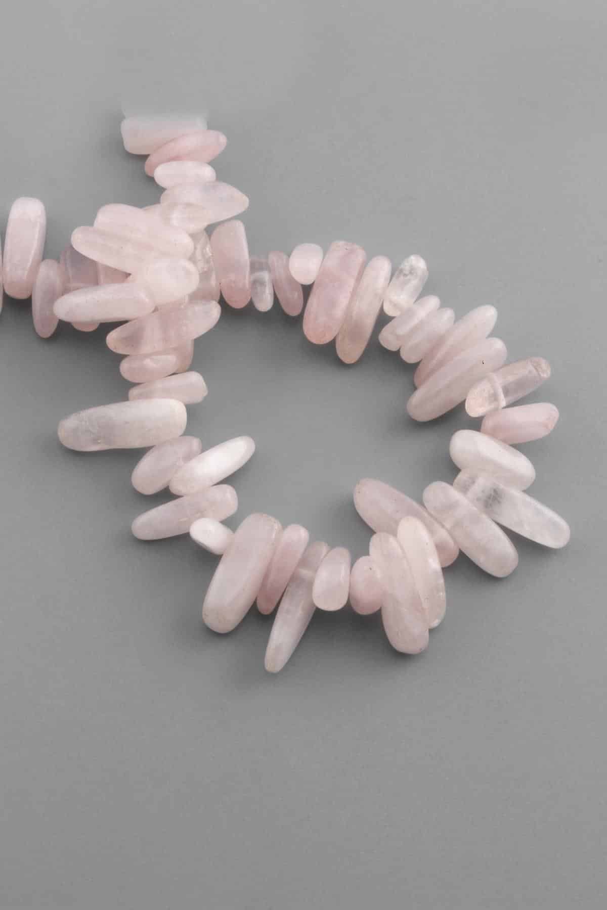 Pink Quartz Natural Stone Tooth Cut 18x6mm String Of Beads