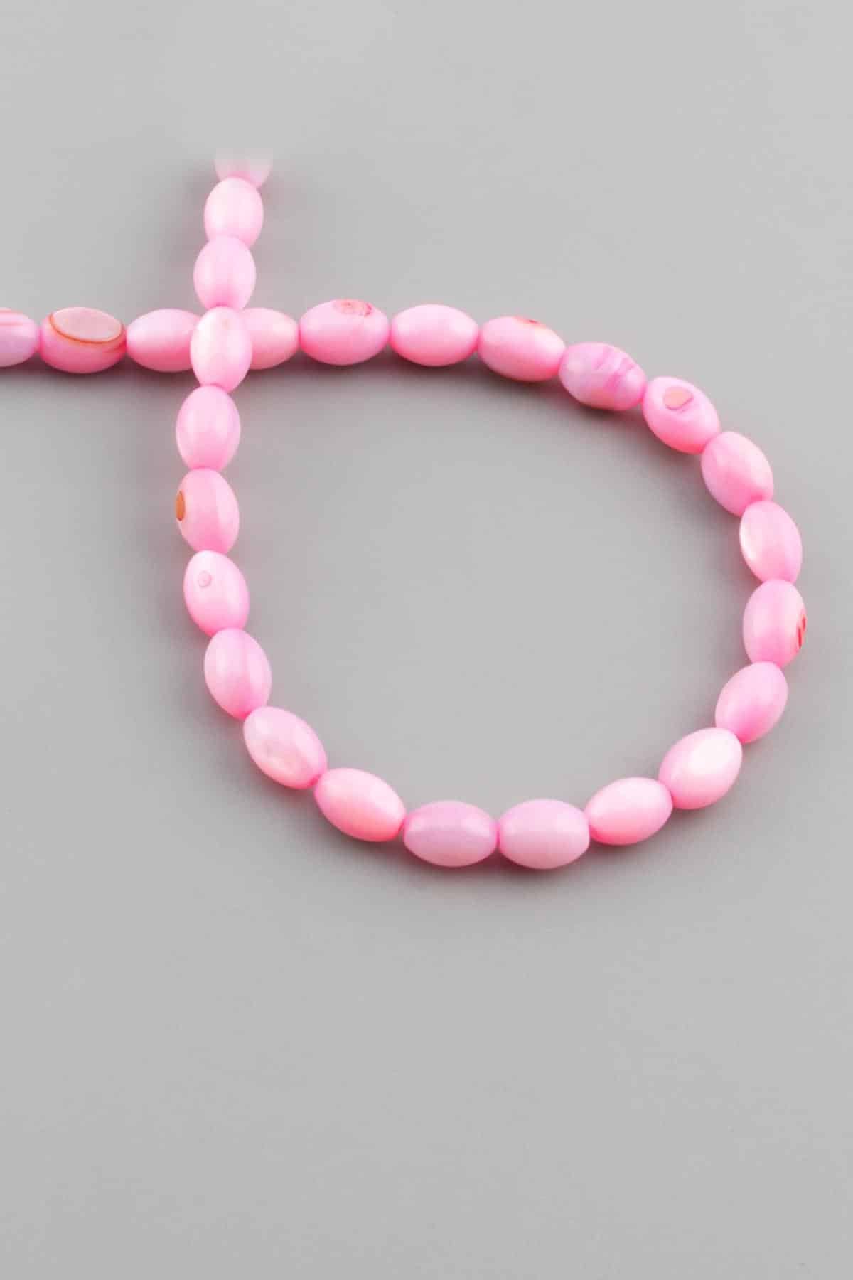 Sedef Taşı Arpa Kesim Parlak Pembe 6x8mm Doğal Taş Dizi [AA]