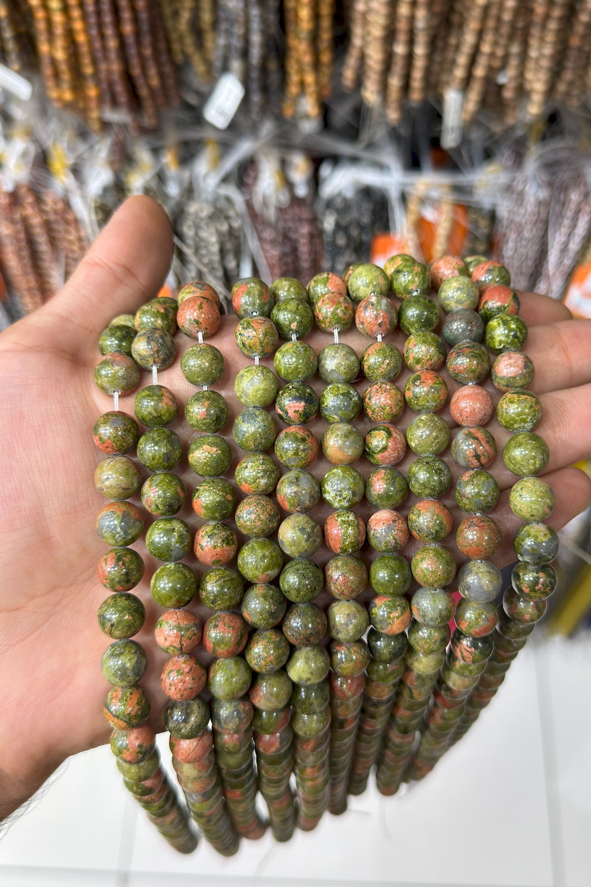 Unakit Natural Stone Shiny Globe Cut 10mm String Of Beads