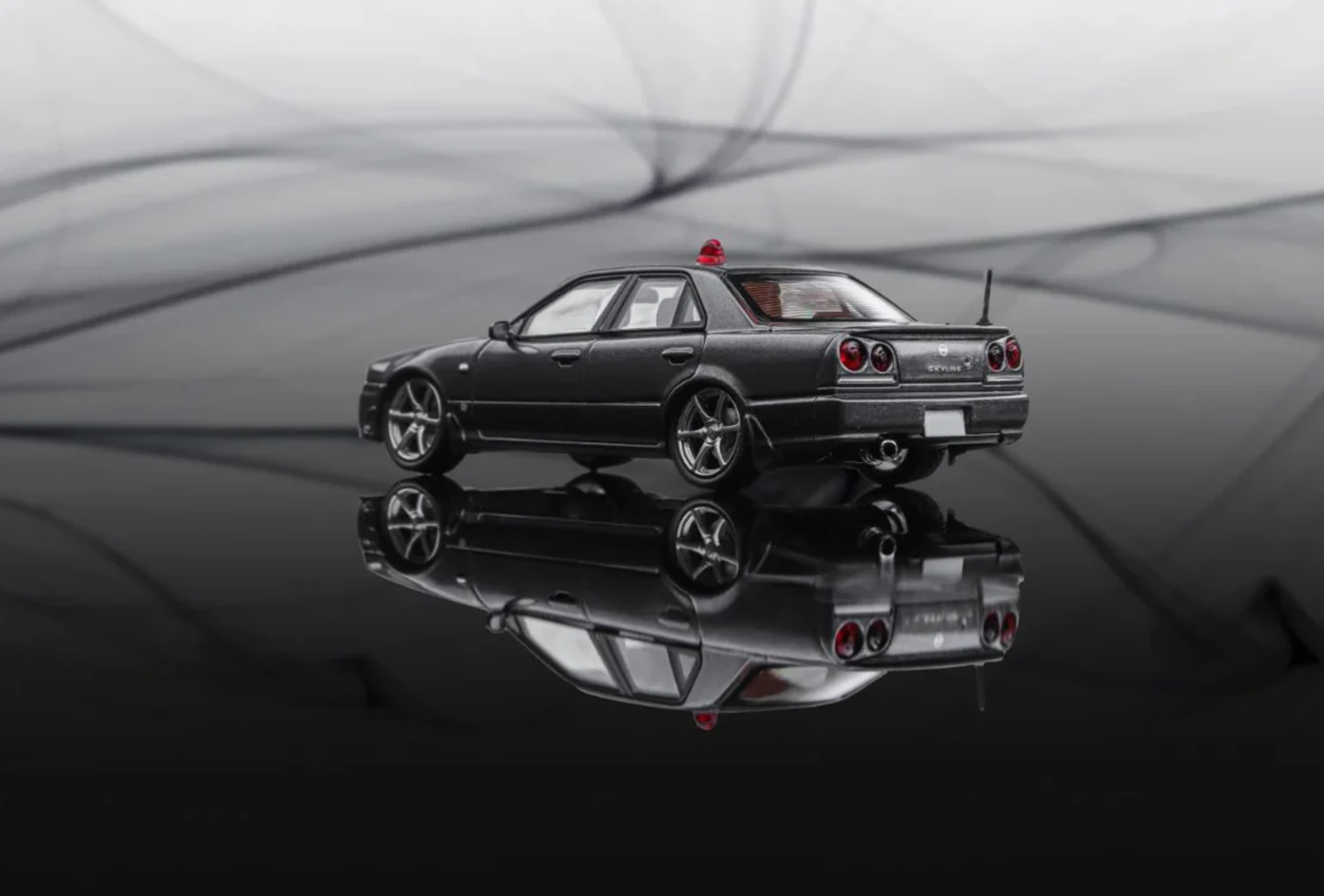 Mortal Nissan Skyline R34 GTT Police Gray