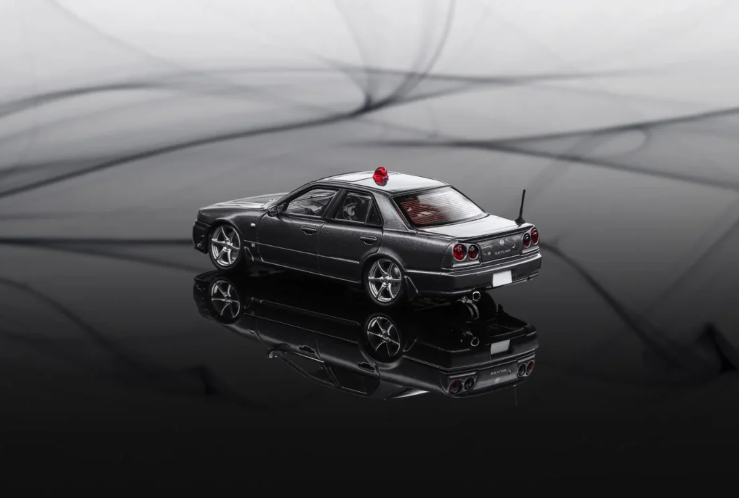 Mortal Nissan Skyline R34 GTT Police Gray