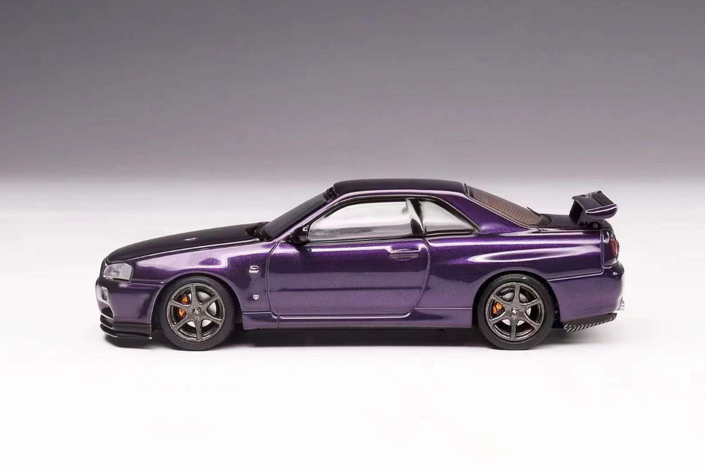 MotorHelix Nissan Skyline GT-R R34 V-Spec II Midnight Purple