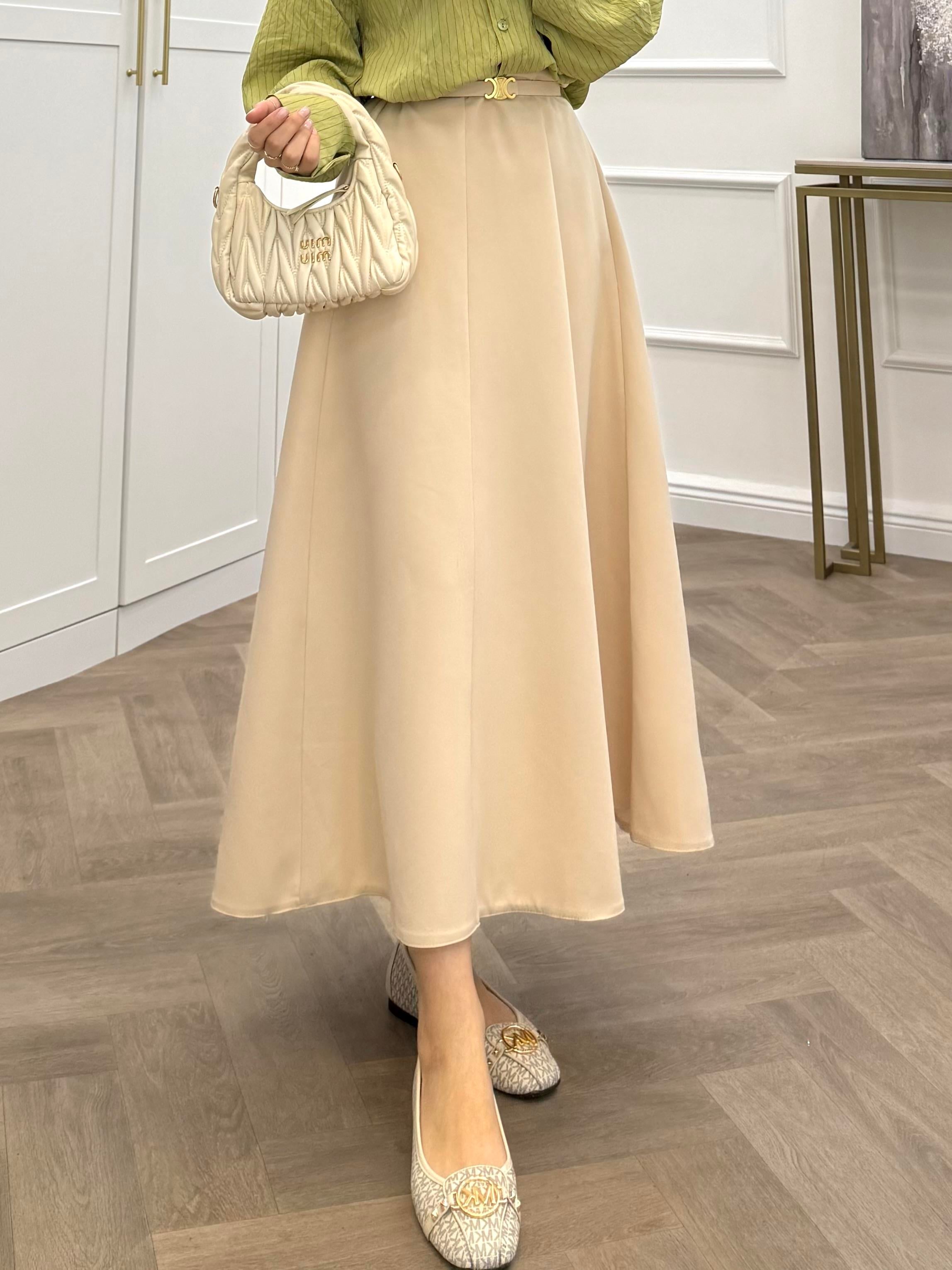 PARÇALI EVAZE ETEK BEJ