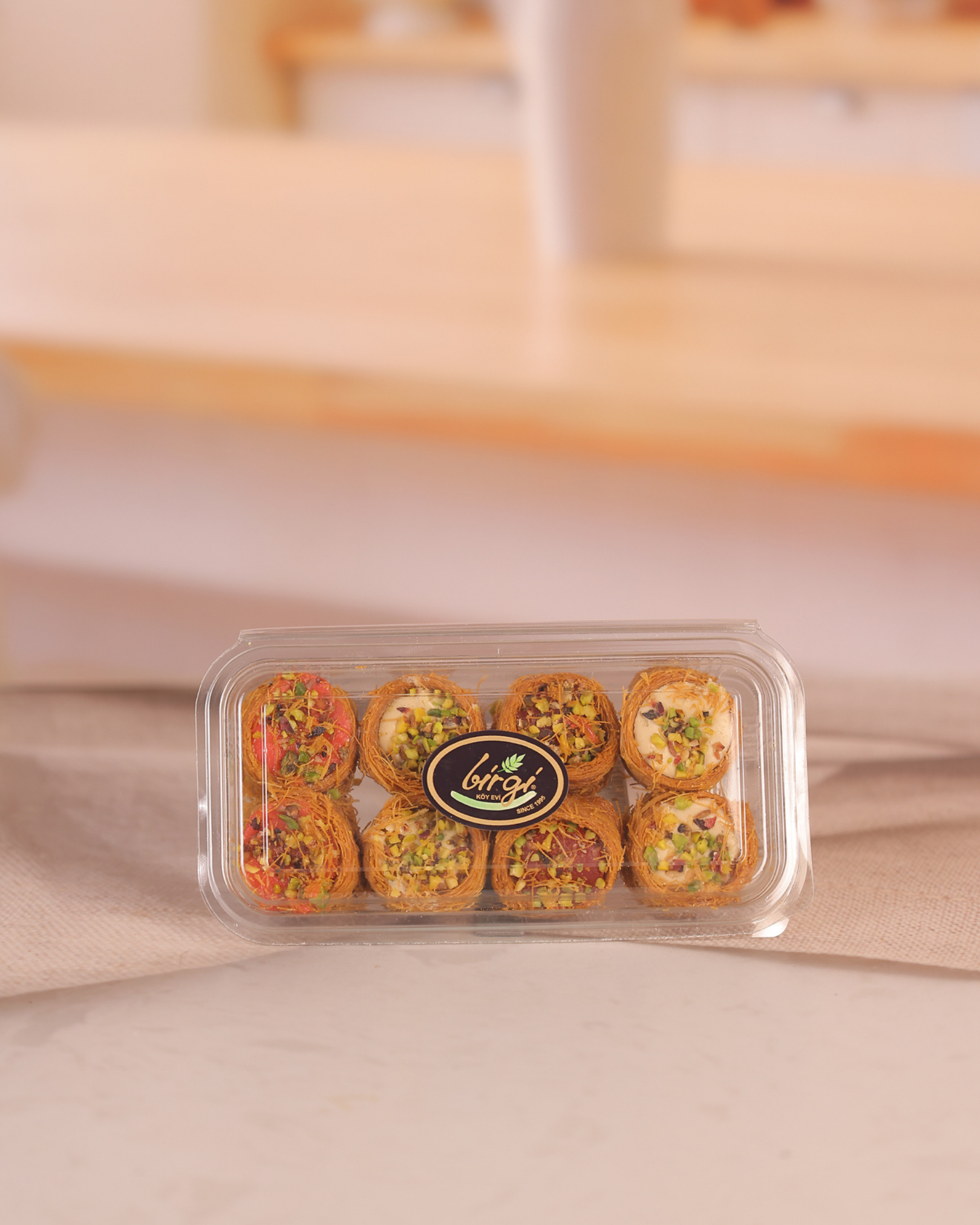 Birgi Köy EviLOKUMLARBirgi Köy Evi Çilekli, Vişneli ve Kaymaklı Karışık Bülbül Yuvası (250 gr)