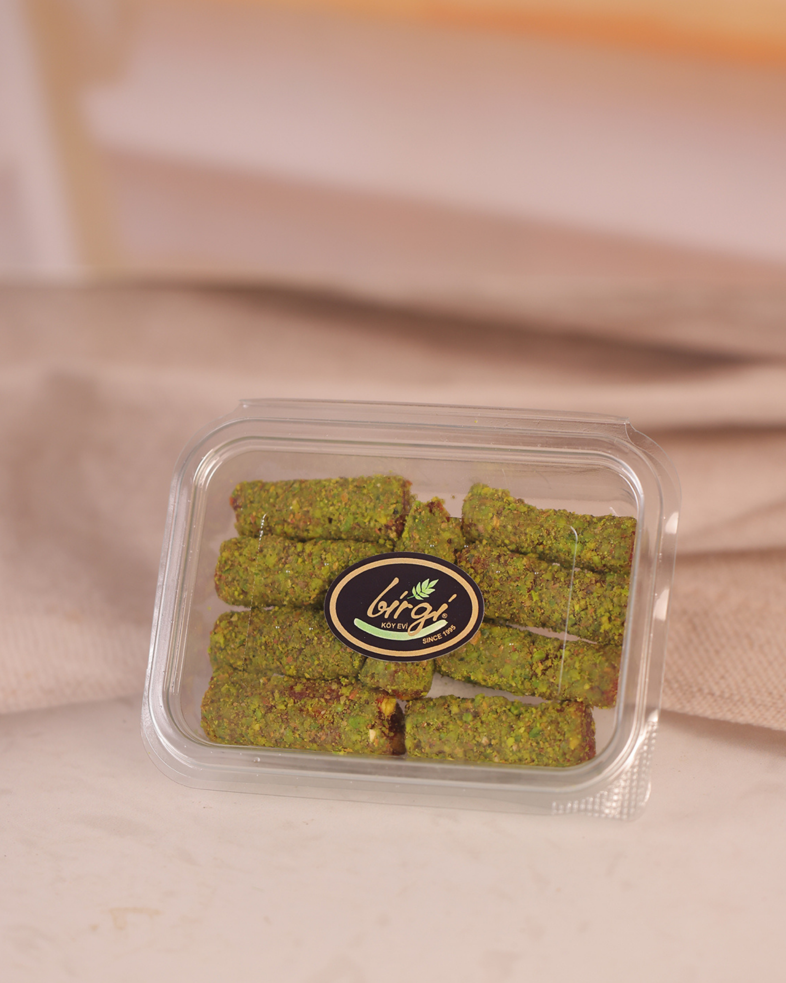 Birgi Köy EviLOKUMLARBirgi Köy Evi Narlı ve Antep Fıstığı Kaplı Parmak Lokum (200 gr)