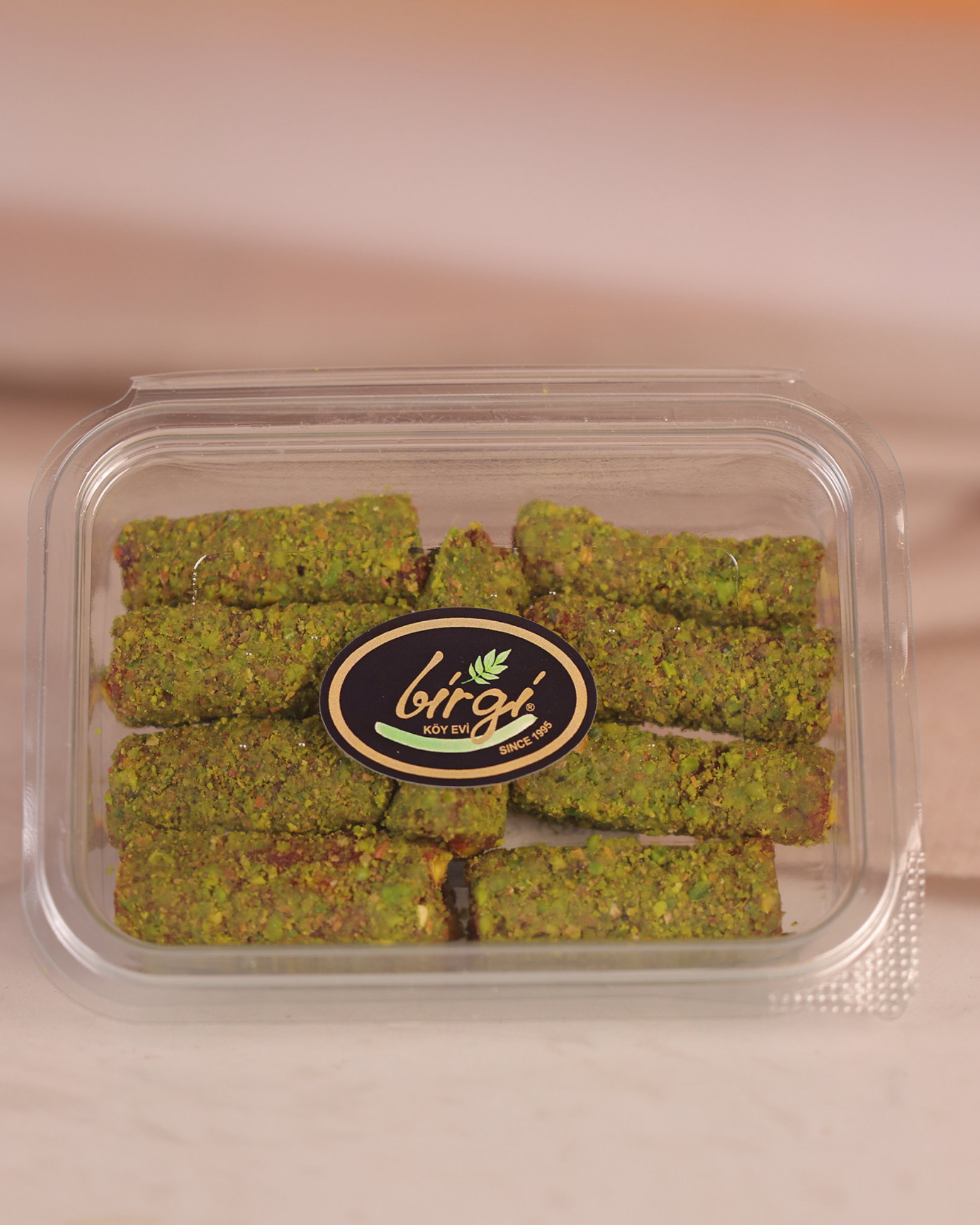 Birgi Köy EviLOKUMLARBirgi Köy Evi Narlı ve Antep Fıstığı Kaplı Parmak Lokum (200 gr)