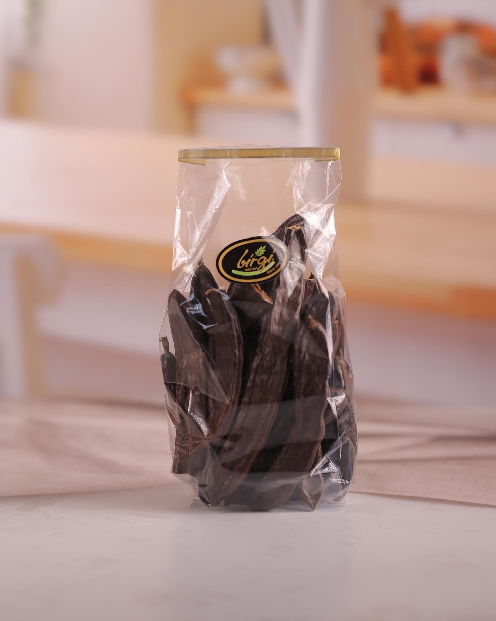 Birgi Köy EviÜRÜNLERİMİZKeçiboynuzu 500 gr – Doğal Harnup | Birgi Köy Evi