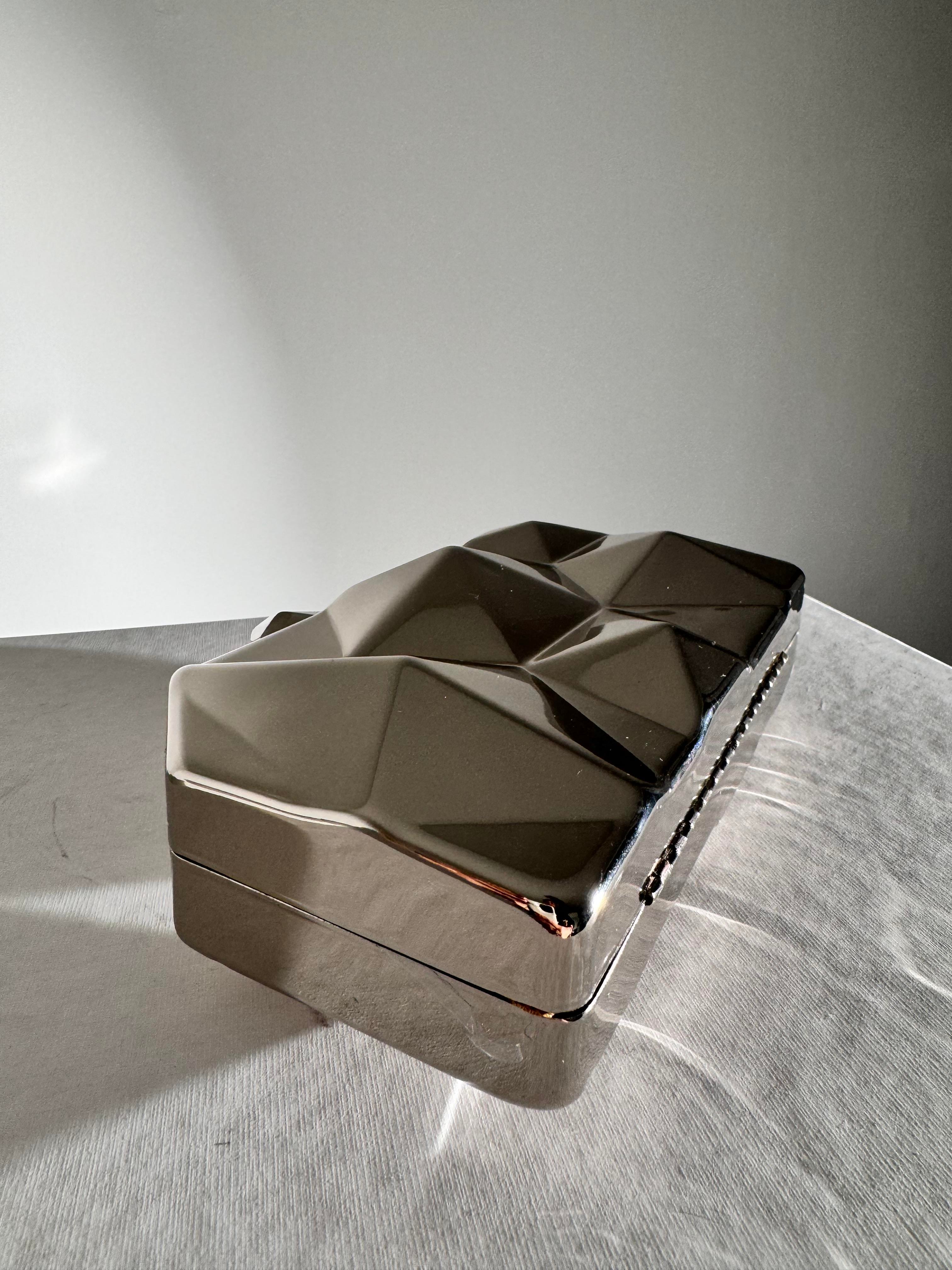 Gümüş Kaplamalı Asimetrik  Clutch Çanta