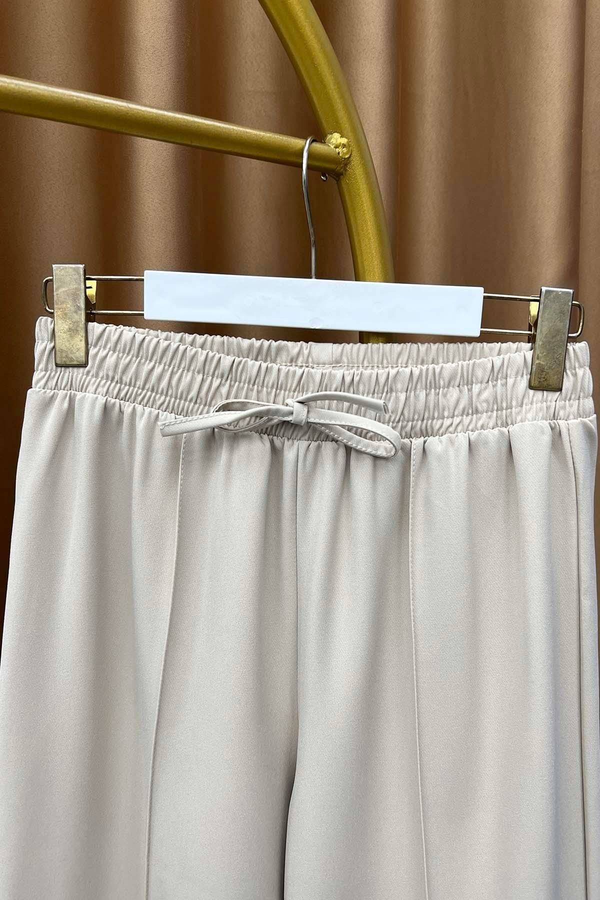 Beli Lastikli Çımalı Krep Pantalon Bej