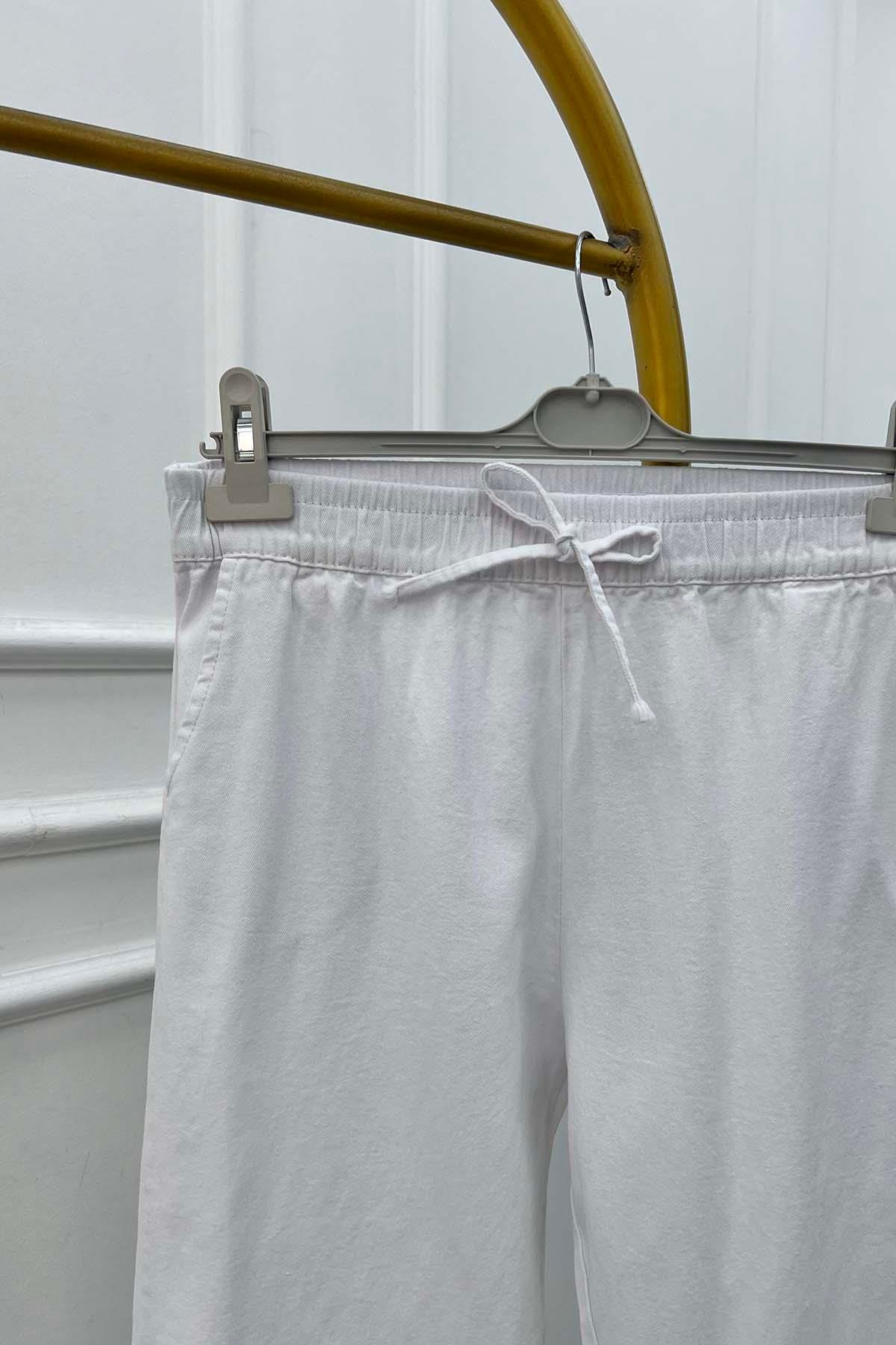 Beli Lastikli Paça Detaylı Kot Pantolon Beyaz