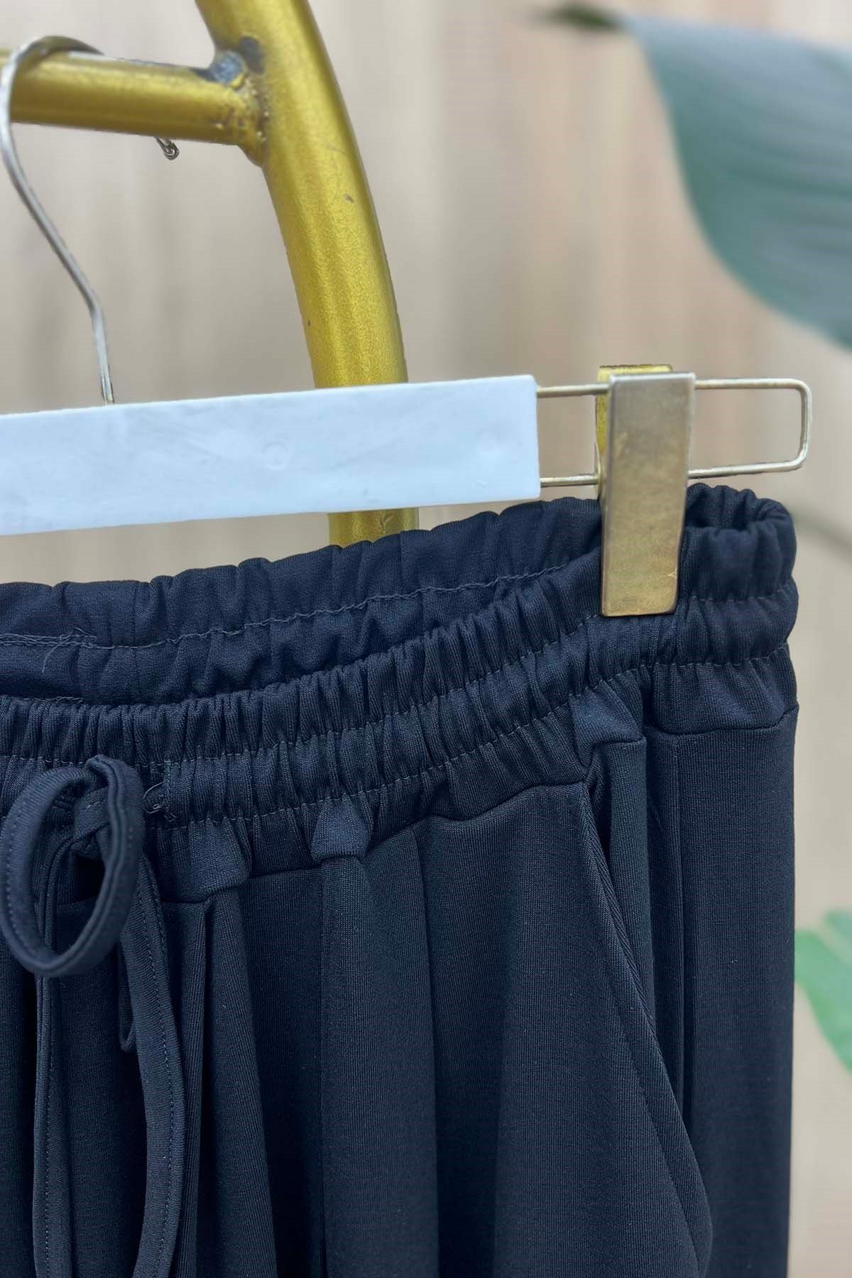 Beli Lastikli Rahat Kalıp Oysh Pantalon Siyah