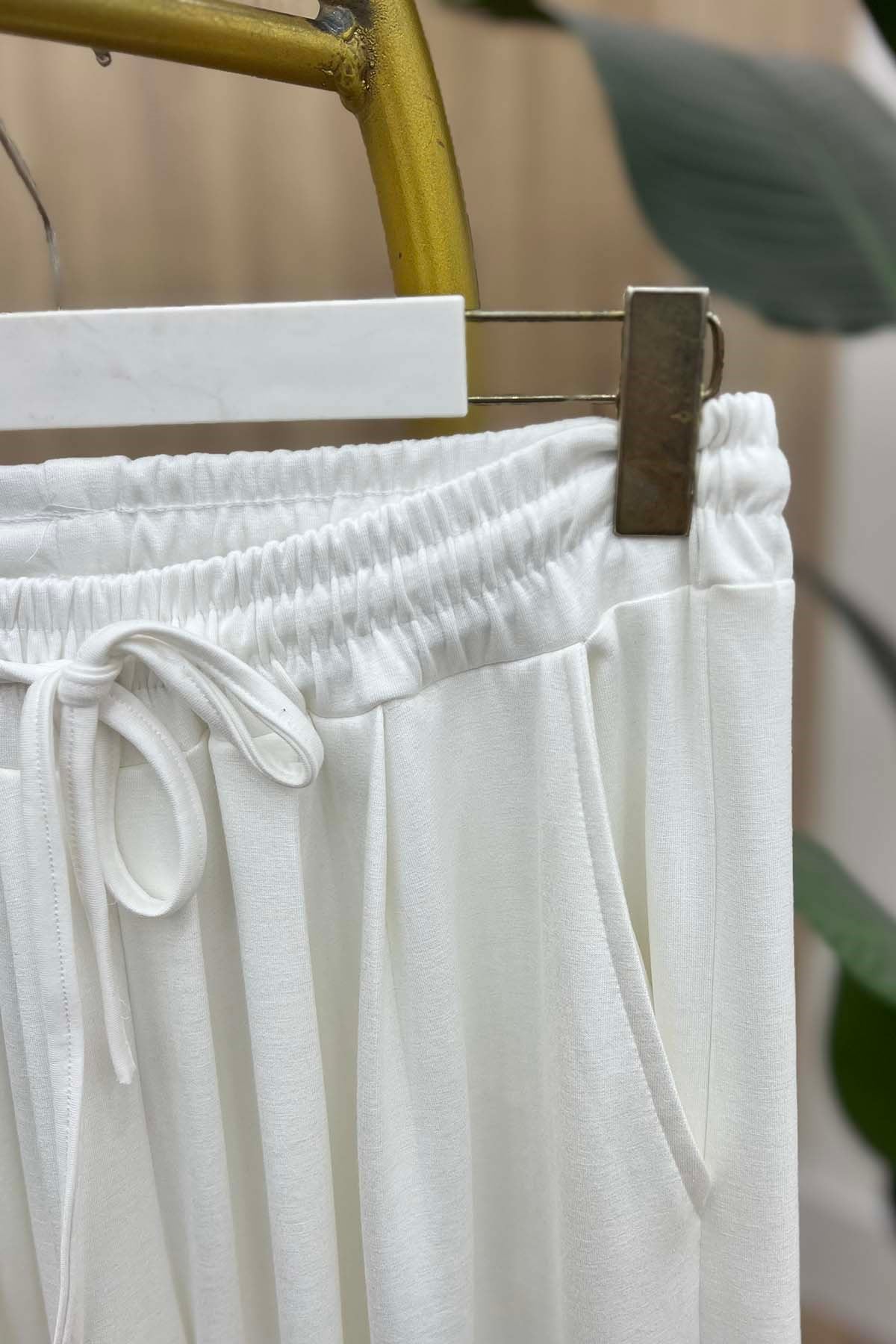 Beli Lastikli Rahat Kalıp Oysh Pantalon Beyaz