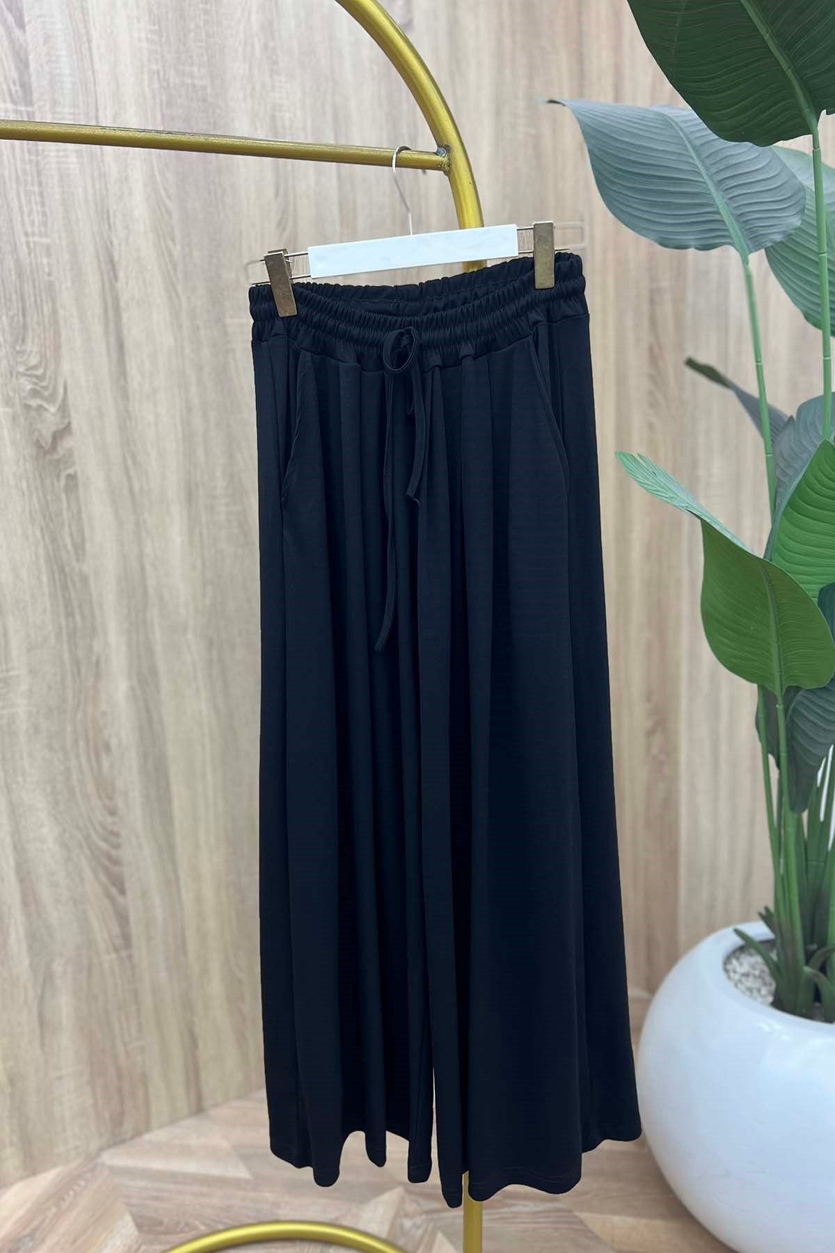 Beli Lastikli Rahat Kalıp Oysh Pantalon Siyah