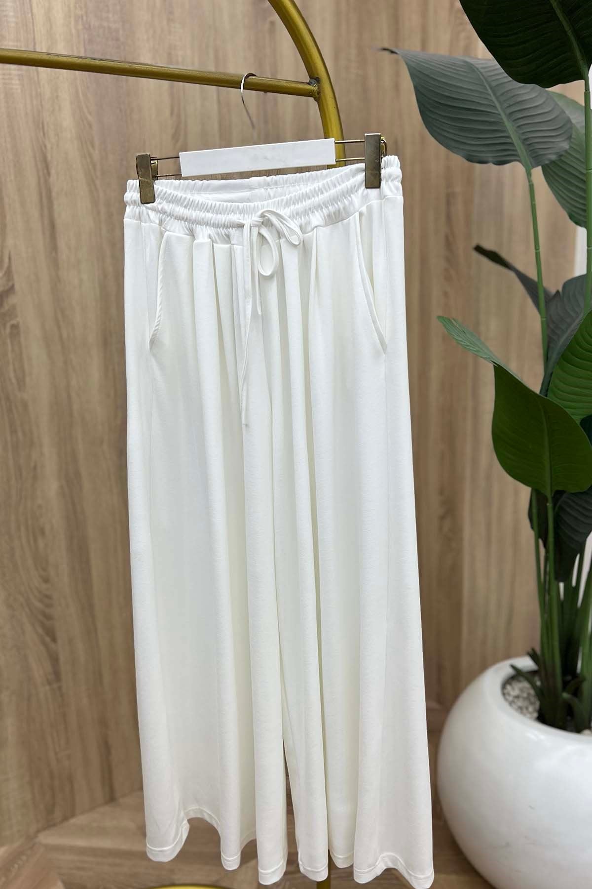 Beli Lastikli Rahat Kalıp Oysh Pantalon Beyaz