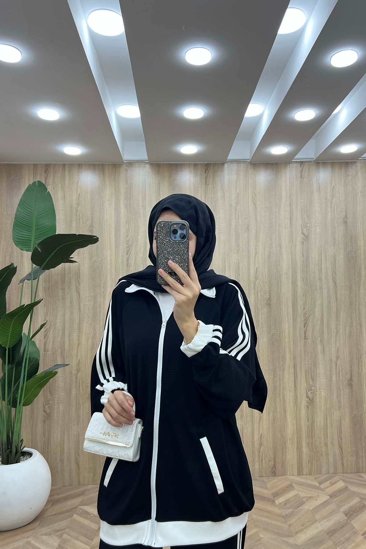 Beyaz Şerit Detaylı Kol-Bilek Lastikli Spor Takım Siyah