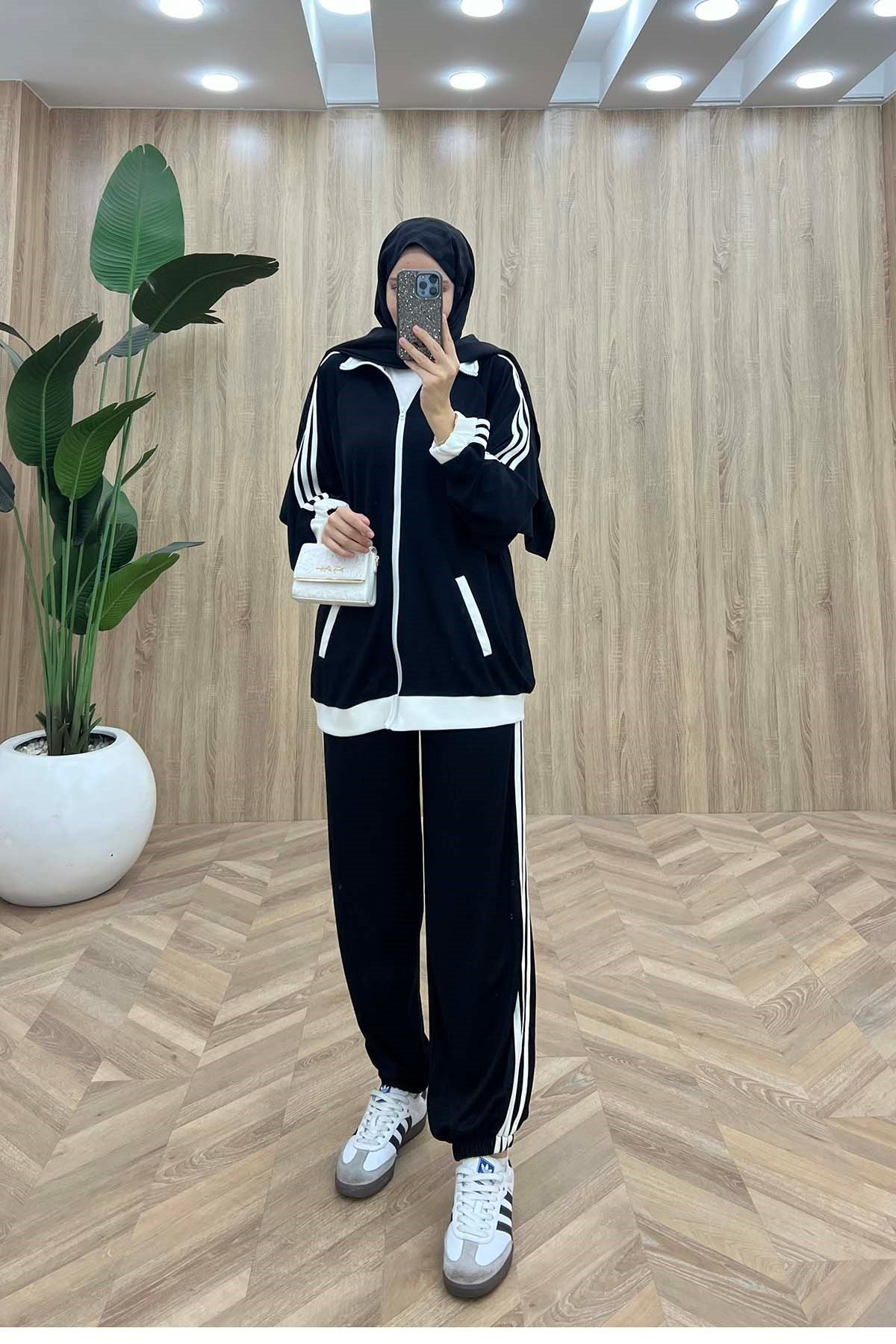 Beyaz Şerit Detaylı Kol-Bilek Lastikli Spor Takım Siyah