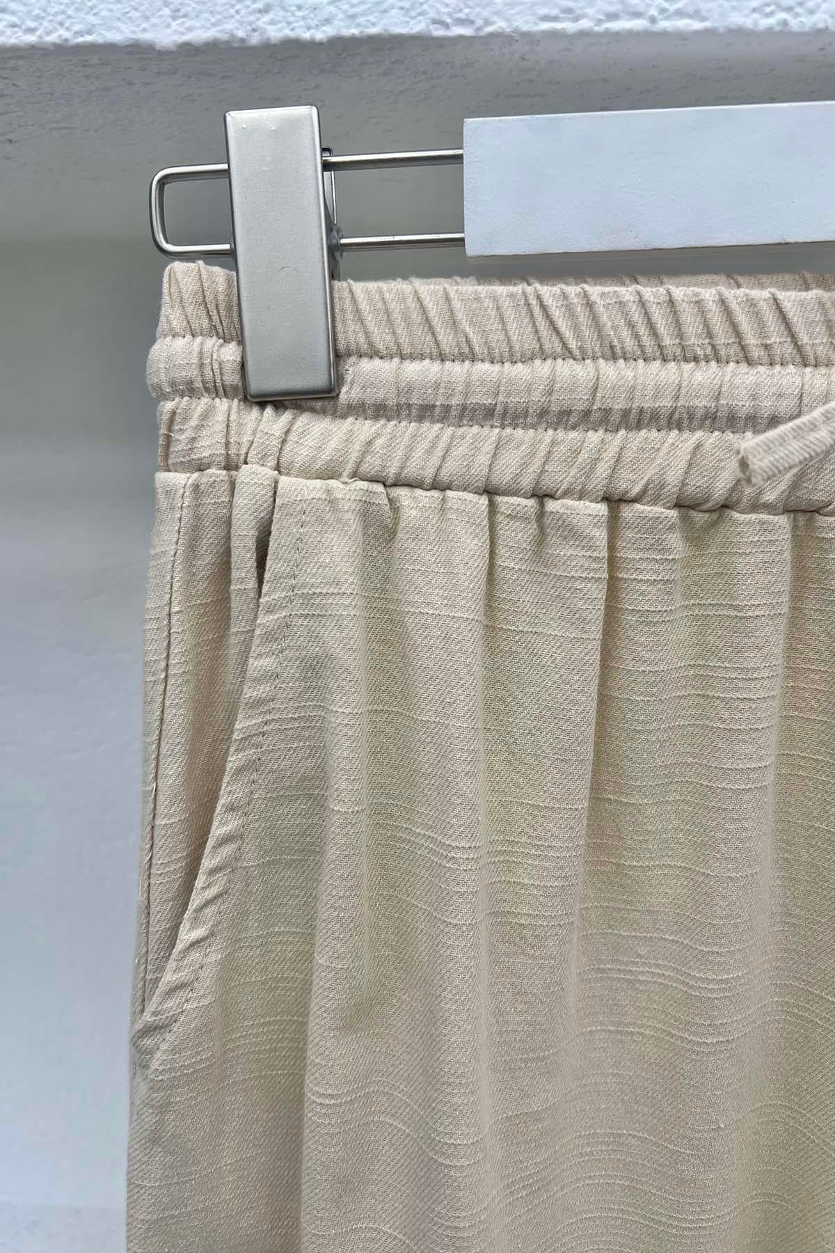 Paça Detaylı Pantolon Bej