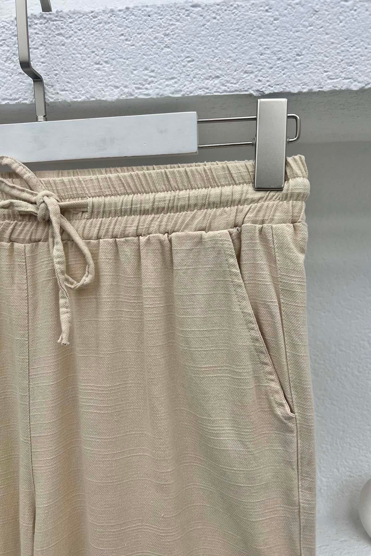 Paça Detaylı Pantolon Bej
