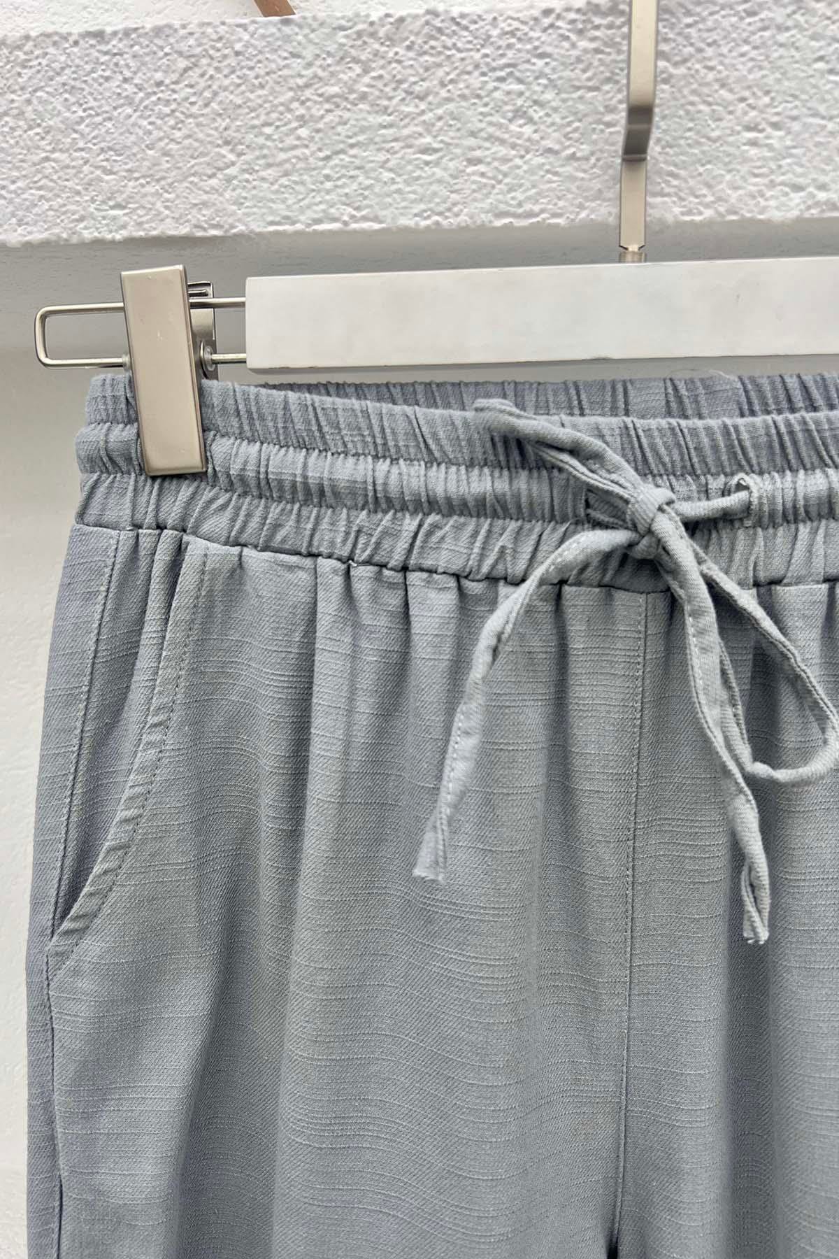 Paça Detaylı Pantolon Gri