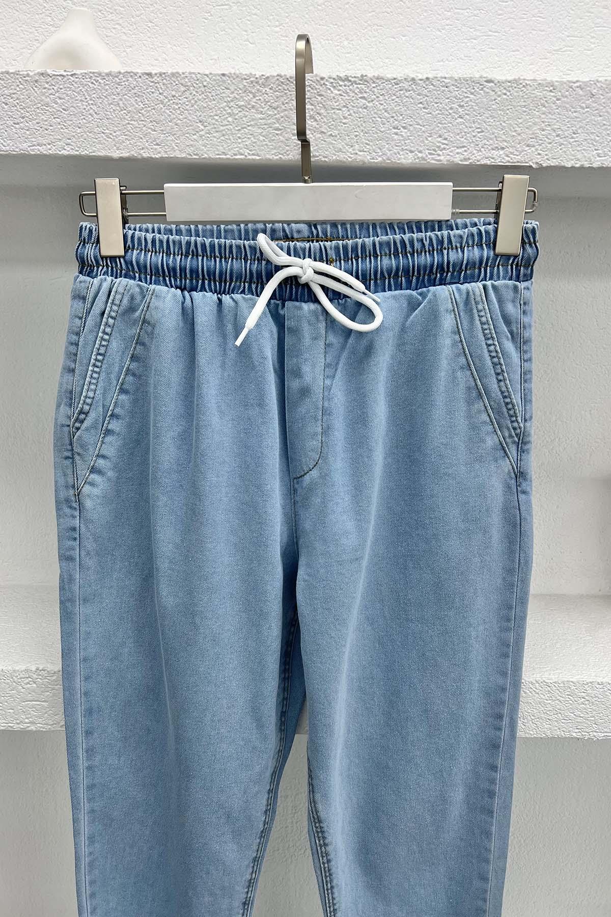 Paça Püsküllü Kot Pantolon Açık Mavi