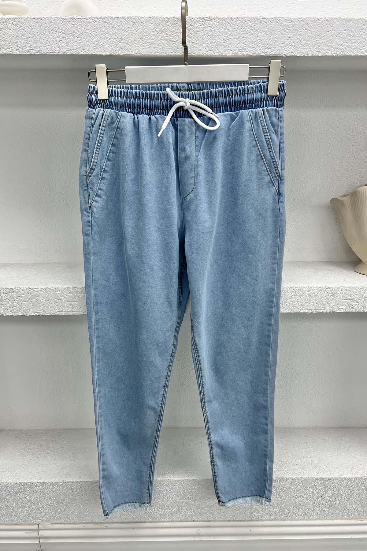 Paça Püsküllü Kot Pantolon Açık Mavi