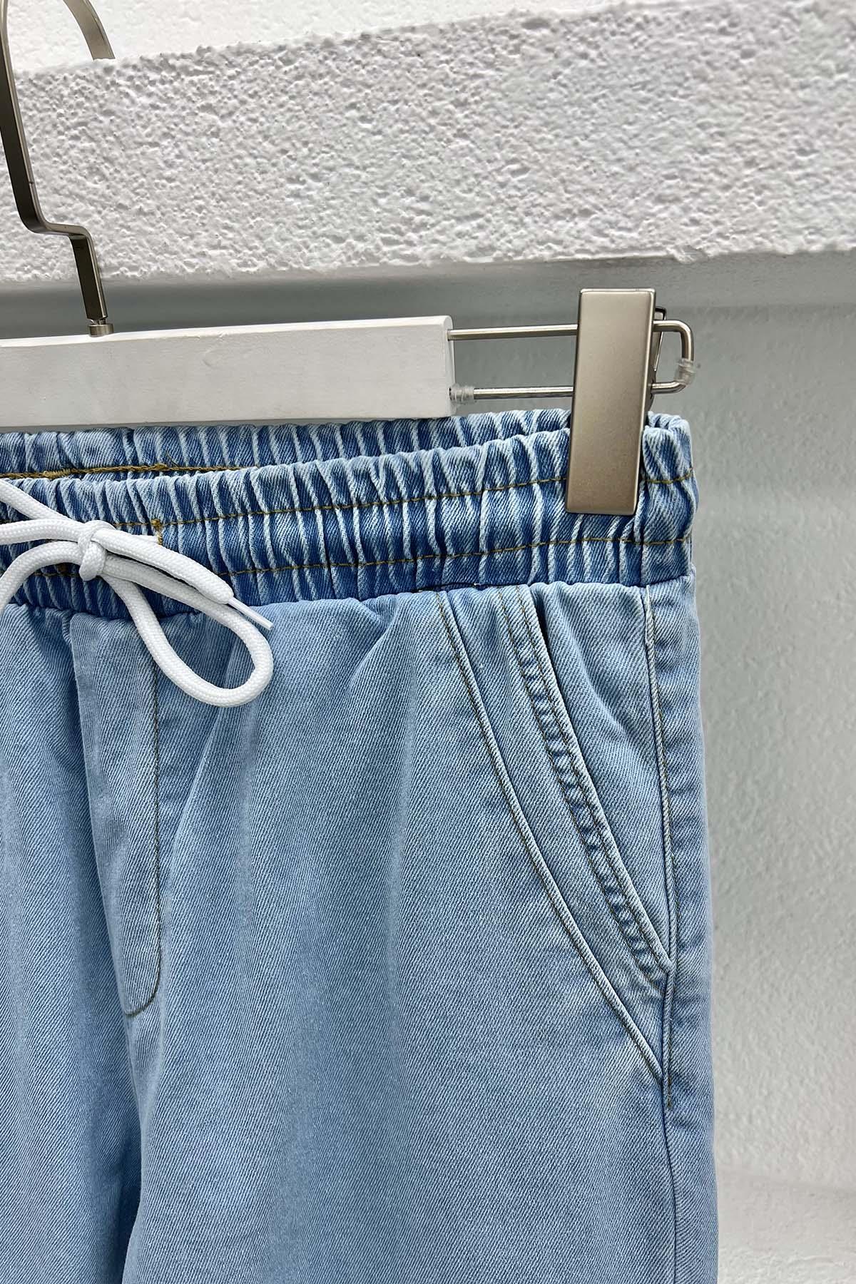 Paça Püsküllü Kot Pantolon Açık Mavi