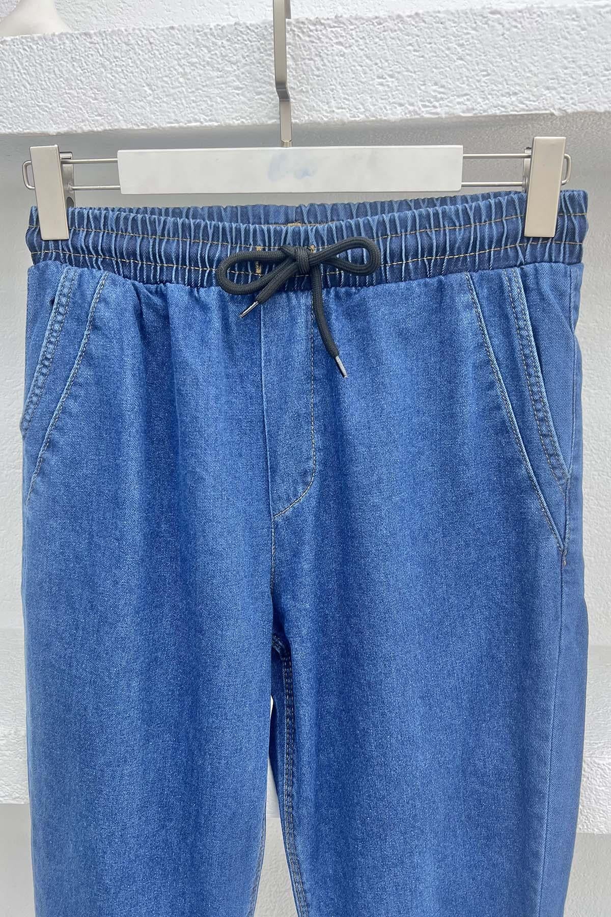 Paça Püsküllü Kot Pantolon Lacivert