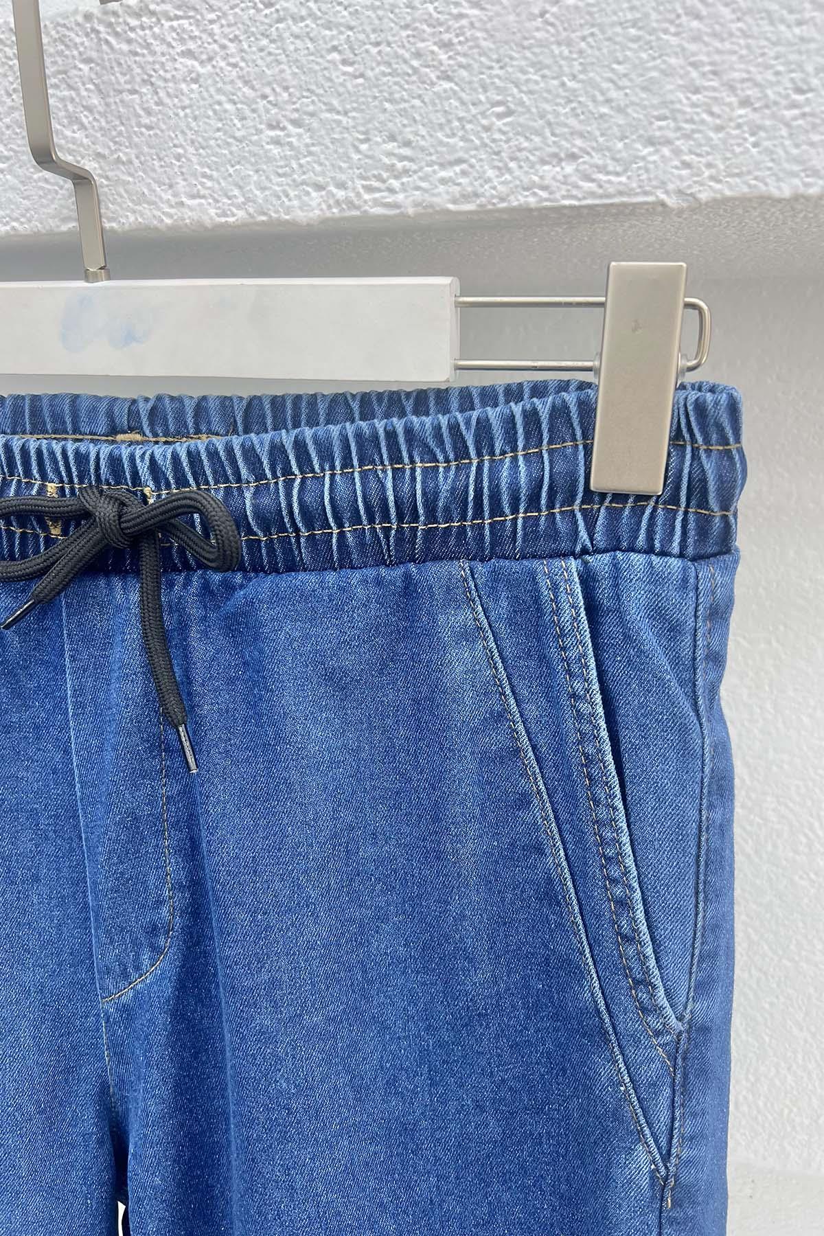 Paça Püsküllü Kot Pantolon Lacivert