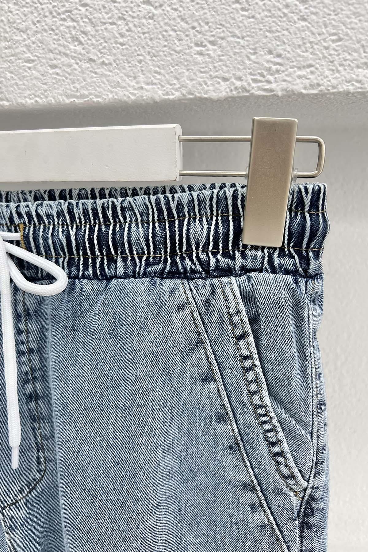 Paça Püsküllü Kot Pantolon Mavi