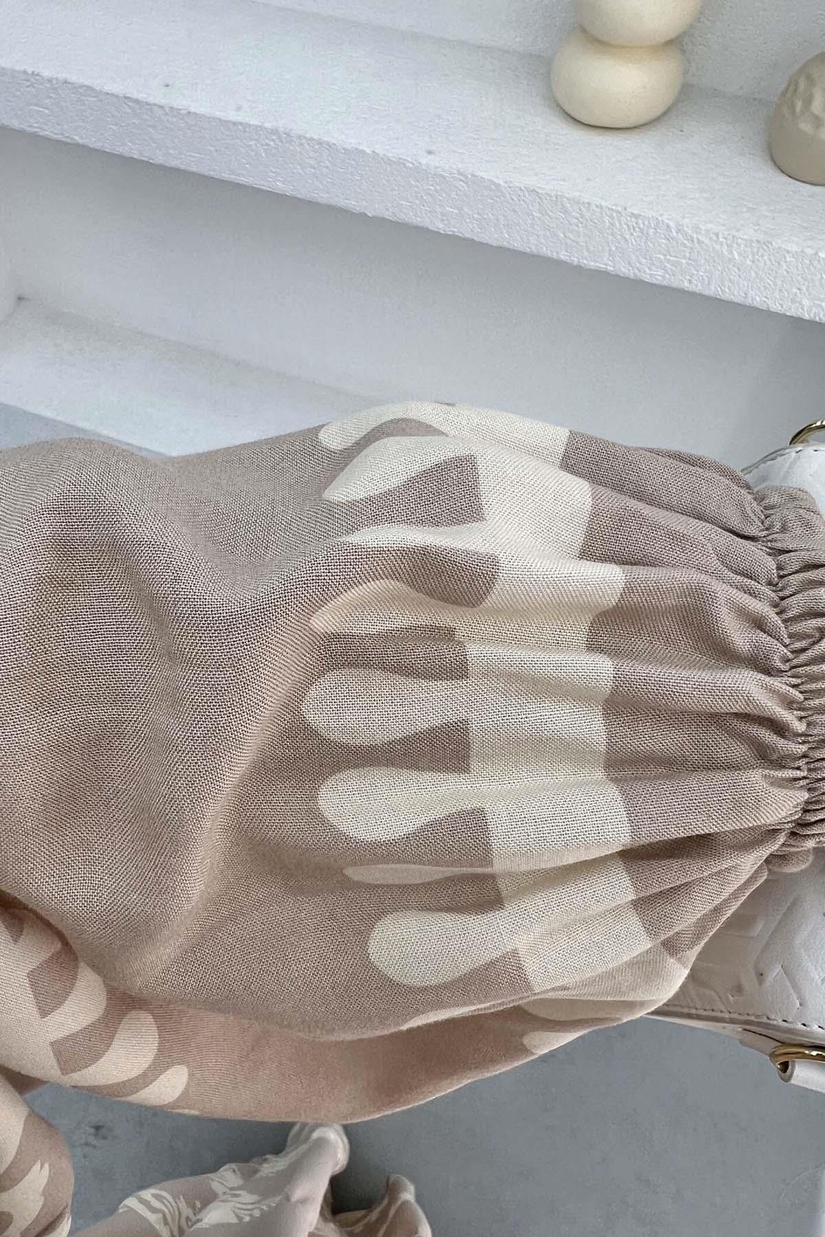 Yarım Düğmeli Desenli Elbise Bej