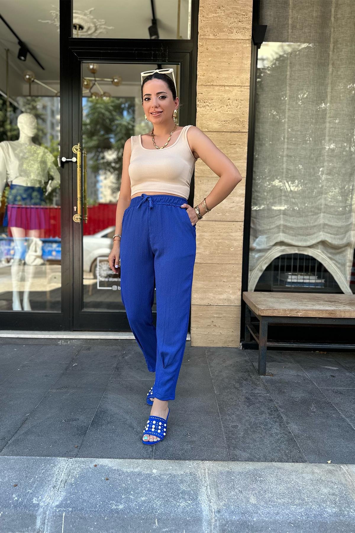 Beli Lastikli Saks Mavi Pantolon