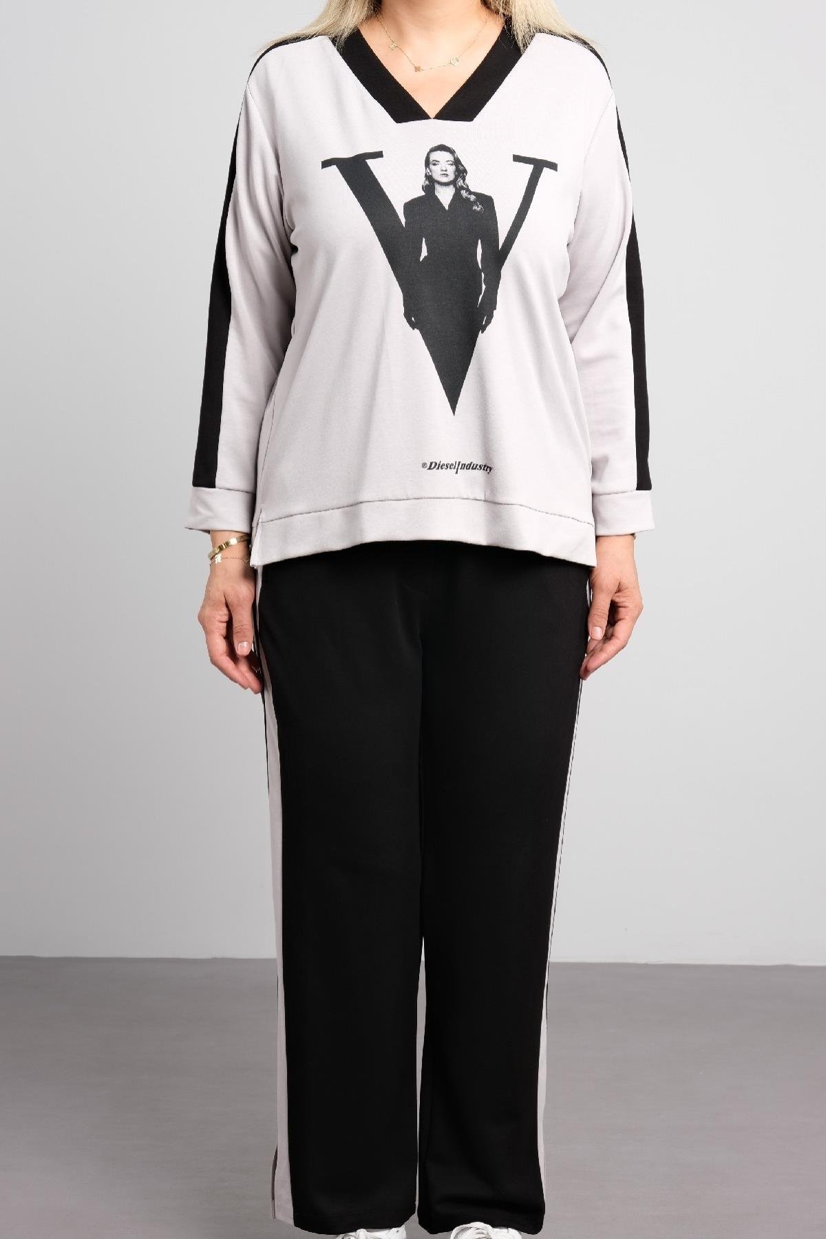 Önü desenli uzun kollu, büyük beden kadın spor tarz takım elbise