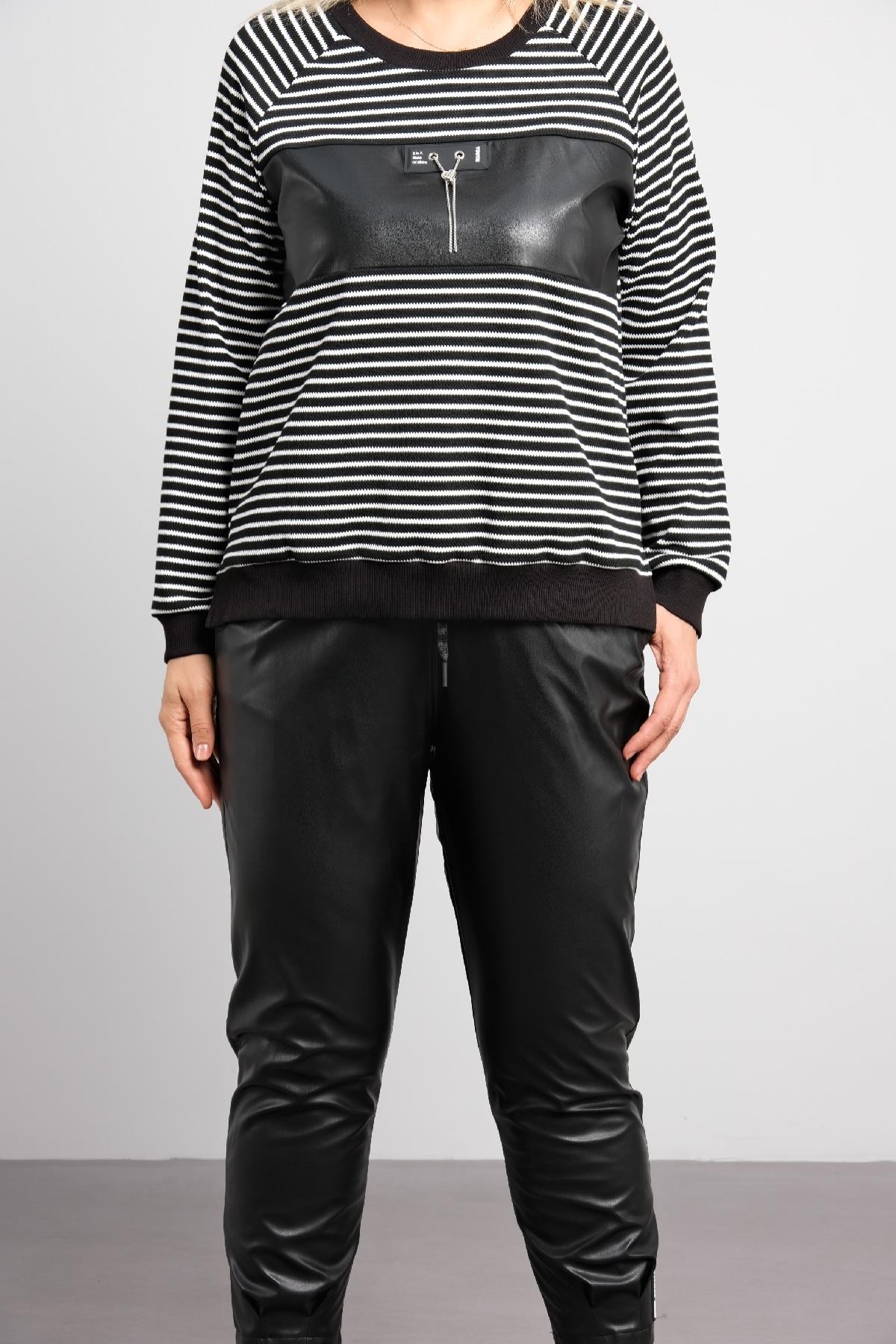 Trençkot ve deri pantolon büyük beden kadın takım elbisesi