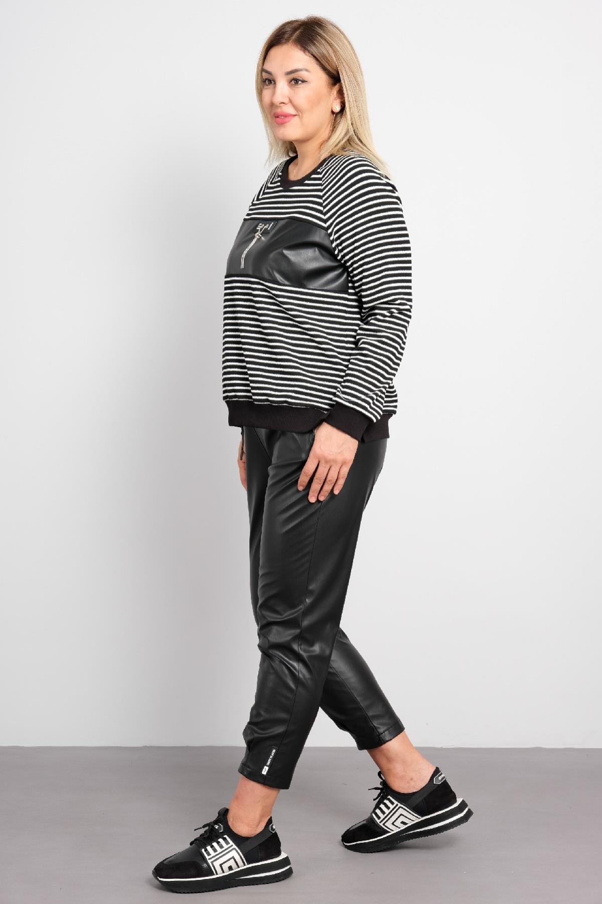 Trençkot ve deri pantolon büyük beden kadın takım elbisesi