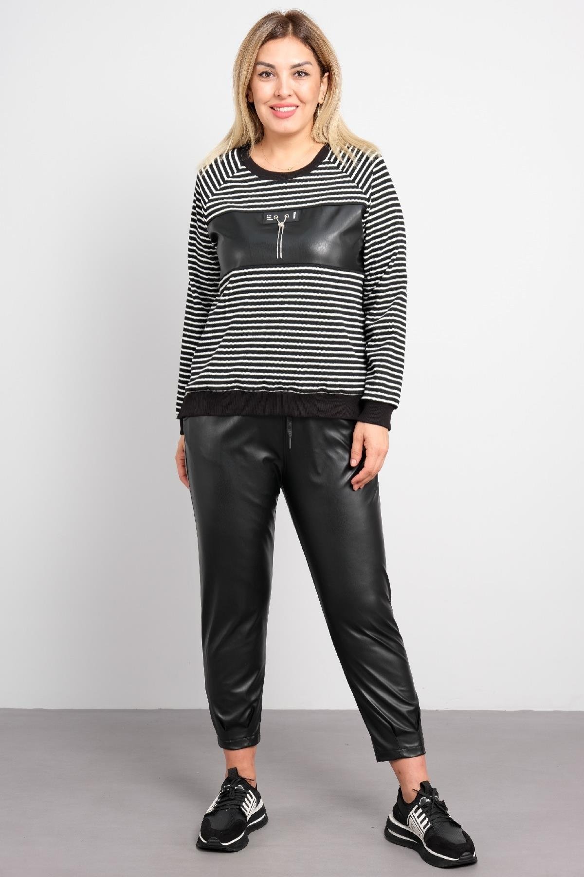 Trençkot ve deri pantolon büyük beden kadın takım elbisesi