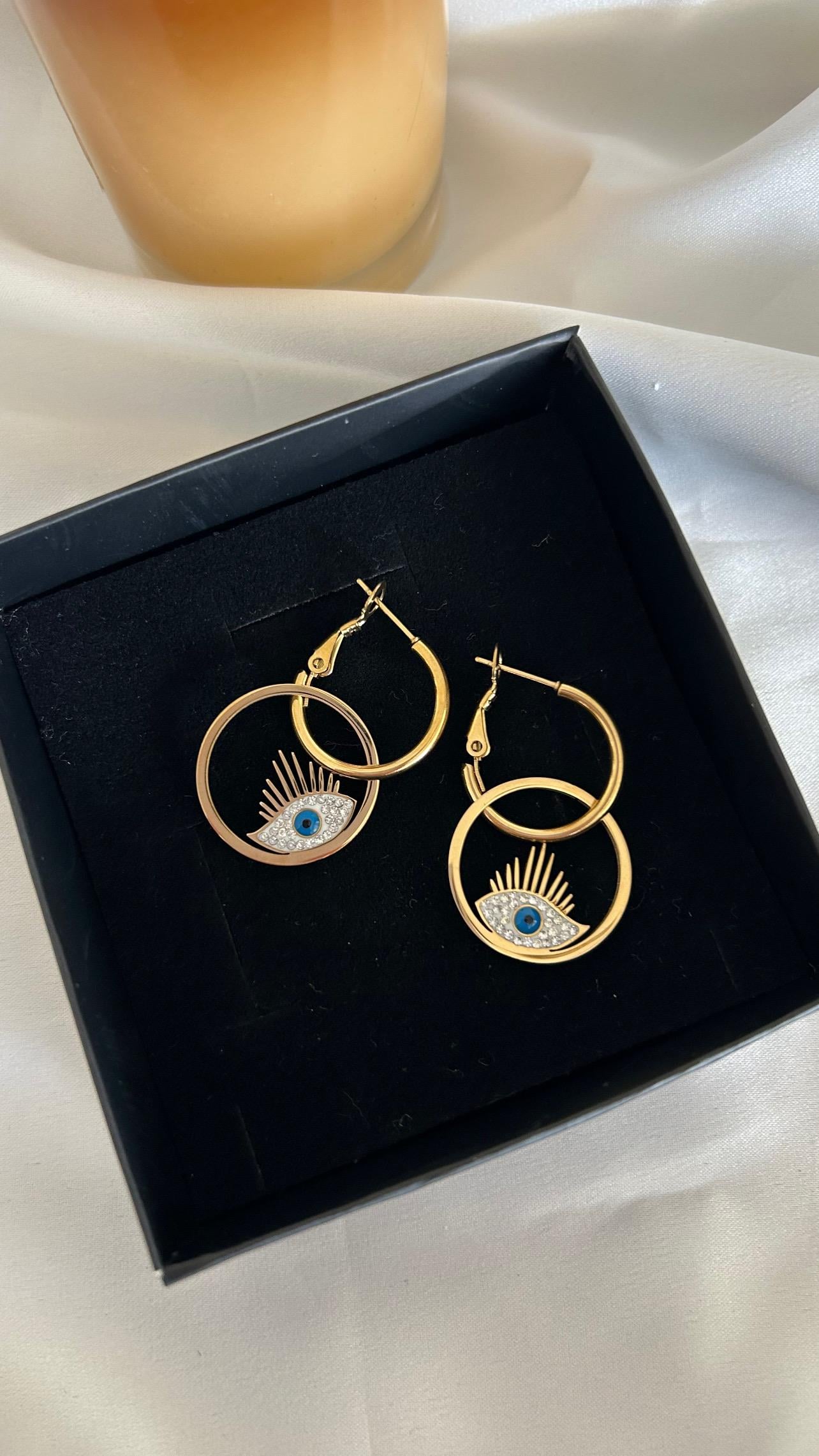 Çift halkalı göz model küpe 