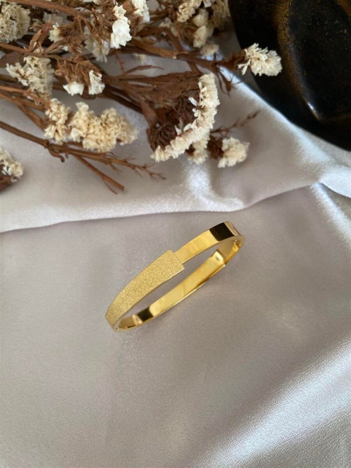 Tasarım simli kelepçe