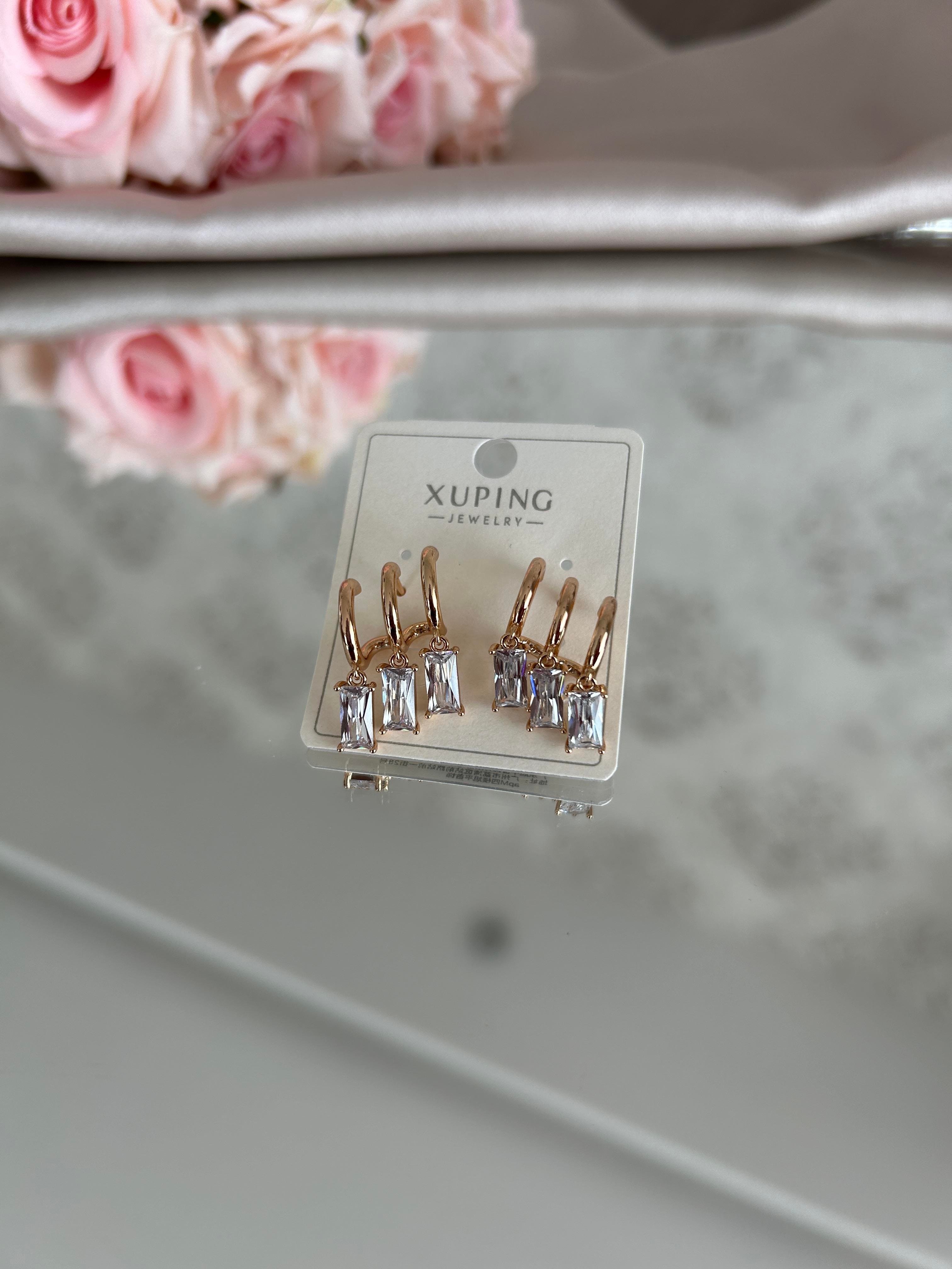 Üç görünümlü taşlı küpe 