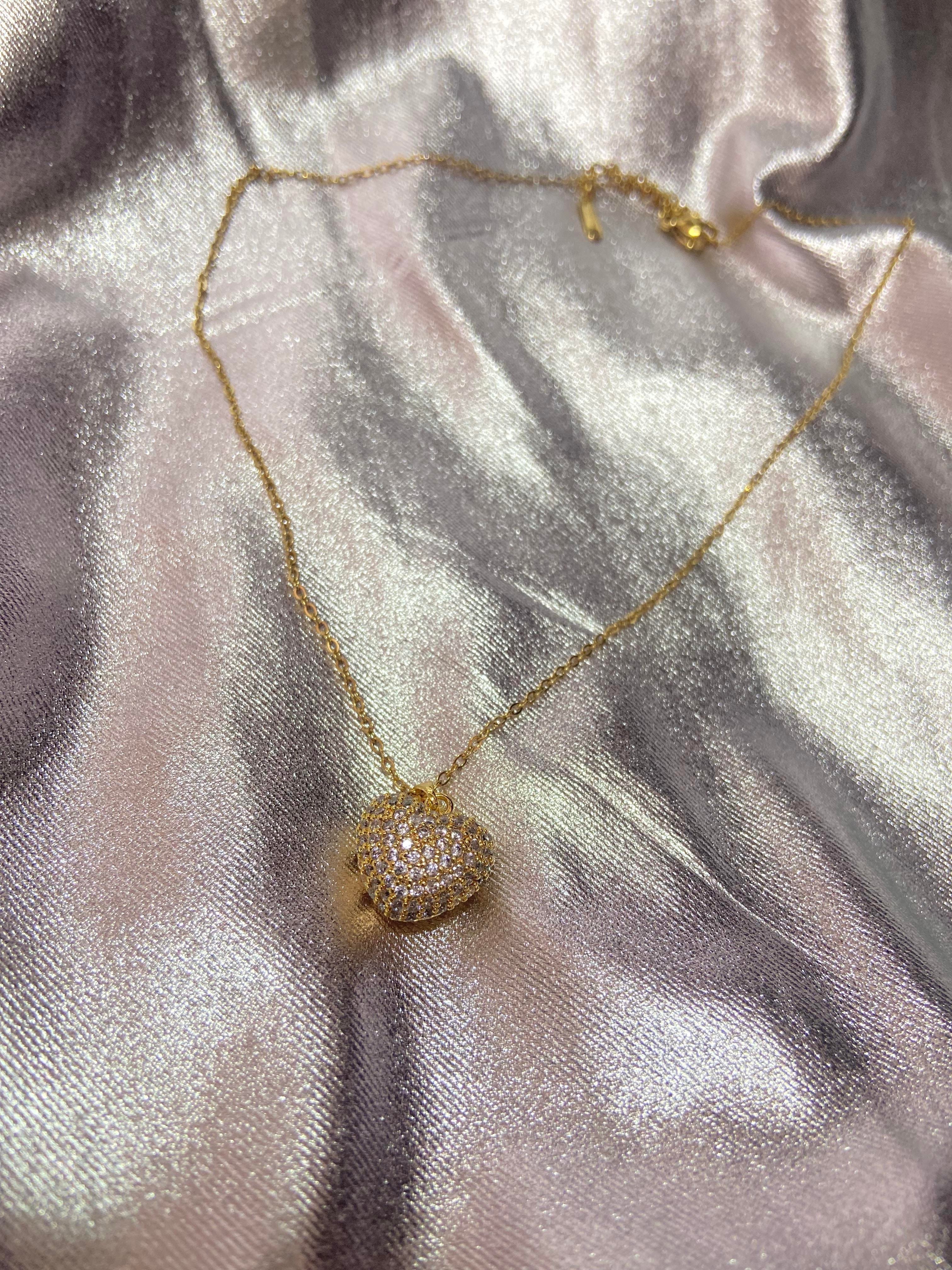 Kalpli Zirkon Taşlı Gold Çelik Kolye