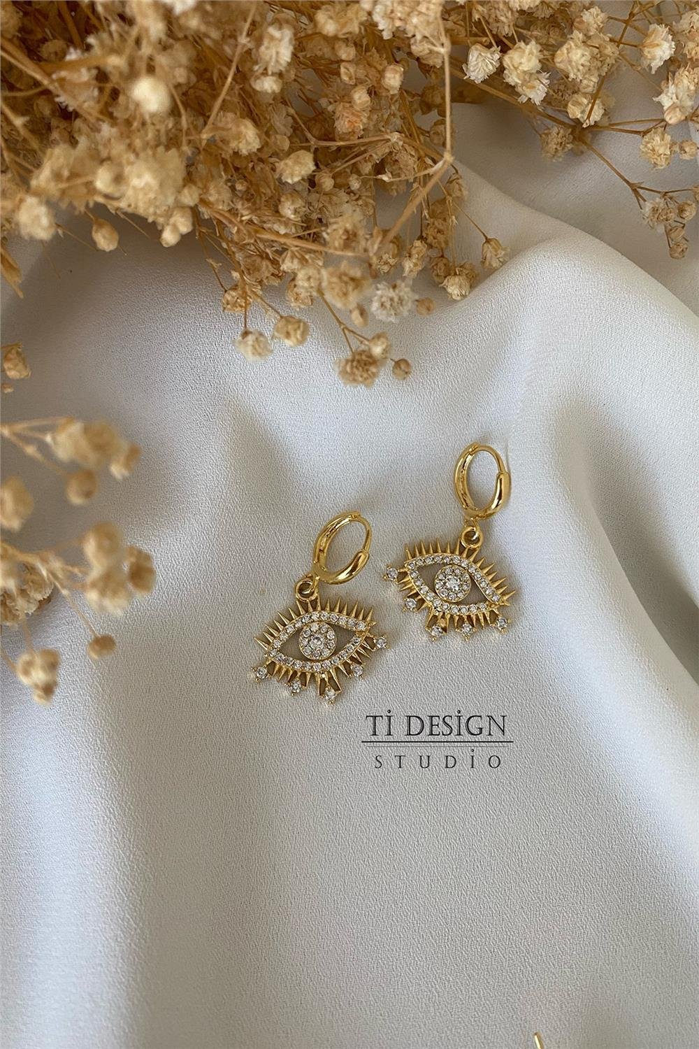 Gözlü Zirkonlu Küpe